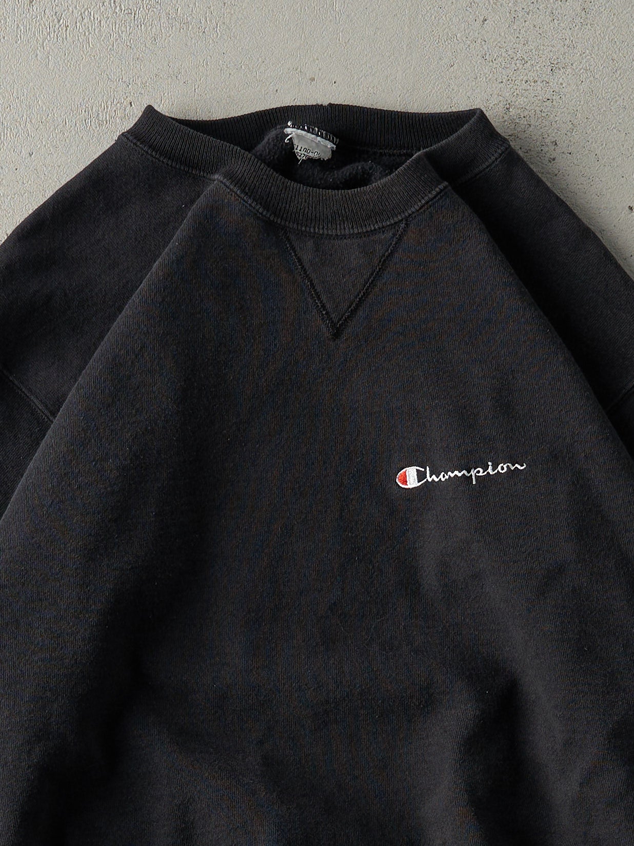 Vintage 90s Faded Black Embroidered Champion Crewneck (L)