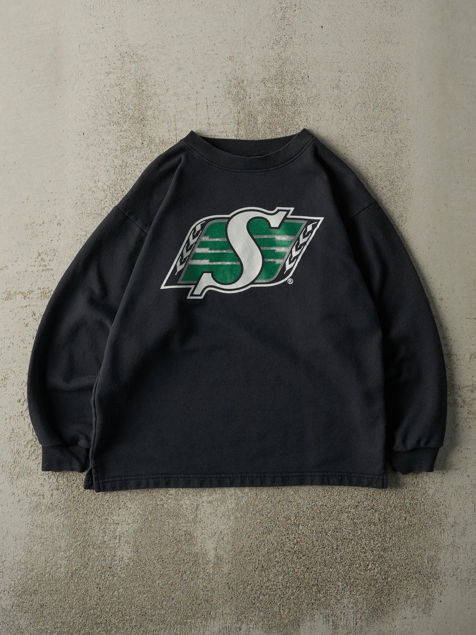 Vintage 90s Black Saskatchewan Roughriders CFL Crewneck (S/M)