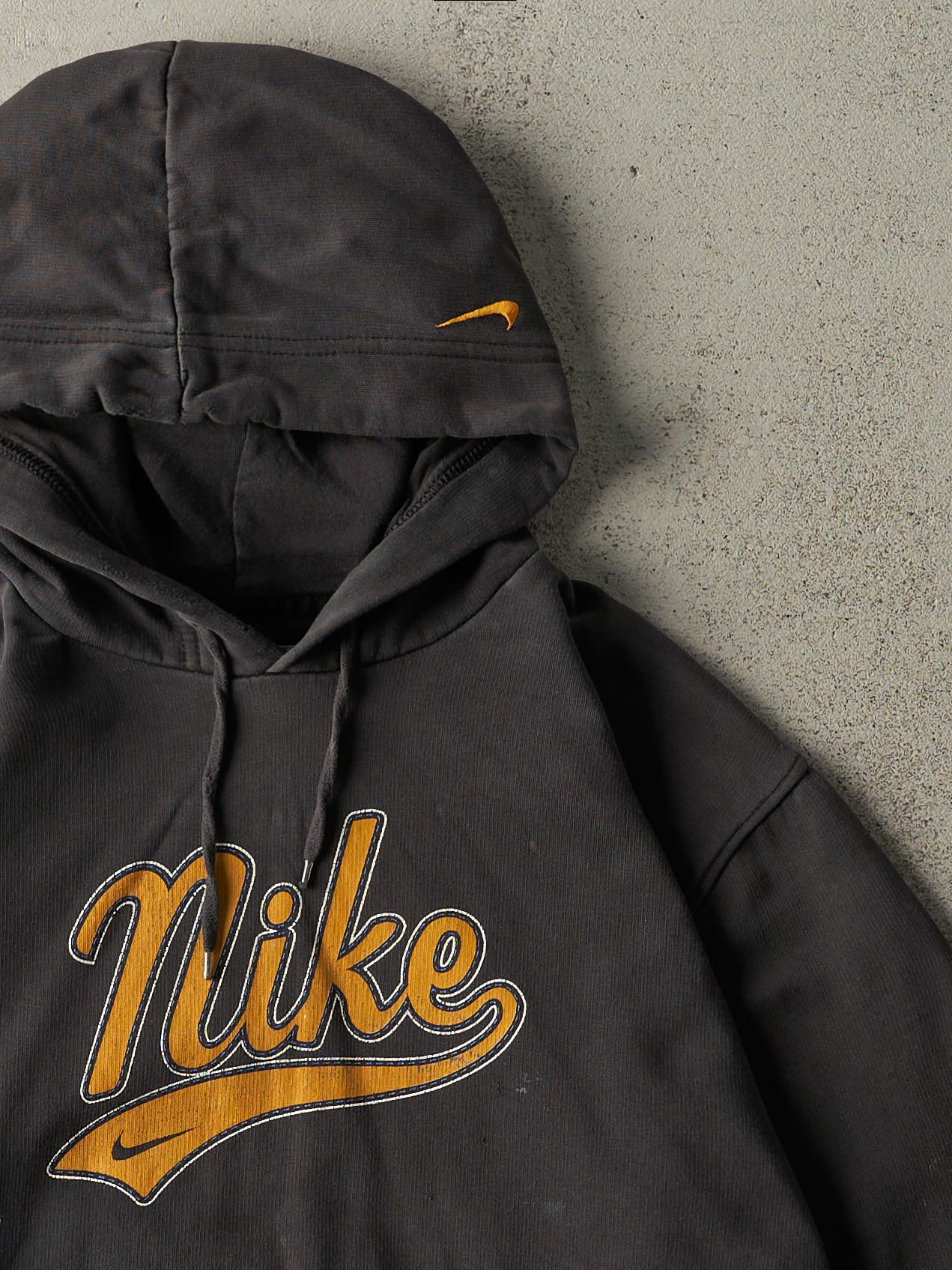 Vintage Y2K Faded Black and Yellow Nike Spell Out Hoodie (L)