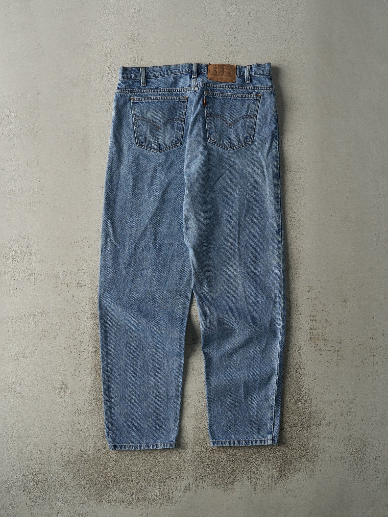 Vintage 90s Light Wash Levi's 550 Orange Tab Jeans (34x31.5)