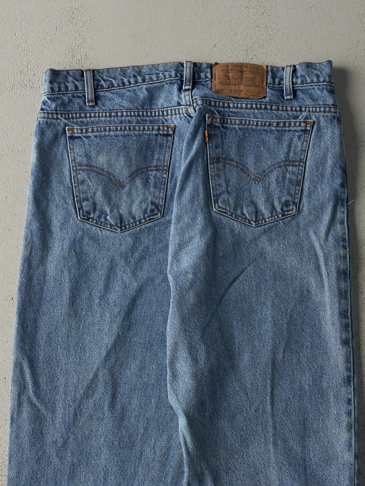 Vintage 90s Light Wash Levi's 550 Orange Tab Jeans (34x31.5)