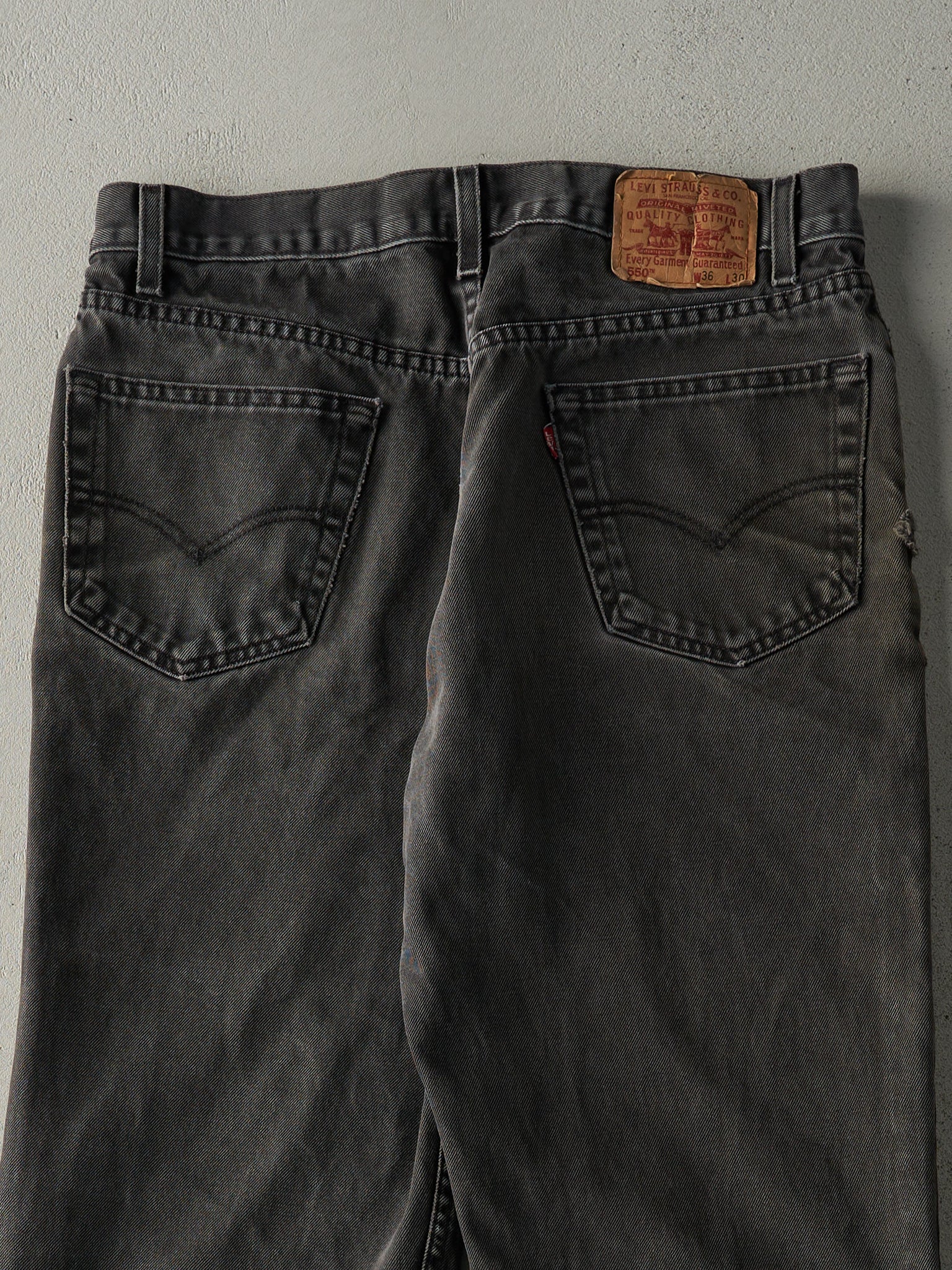 Vintage 90s Faded Black Levi's 550 Denim Pants (35.5x29.5)