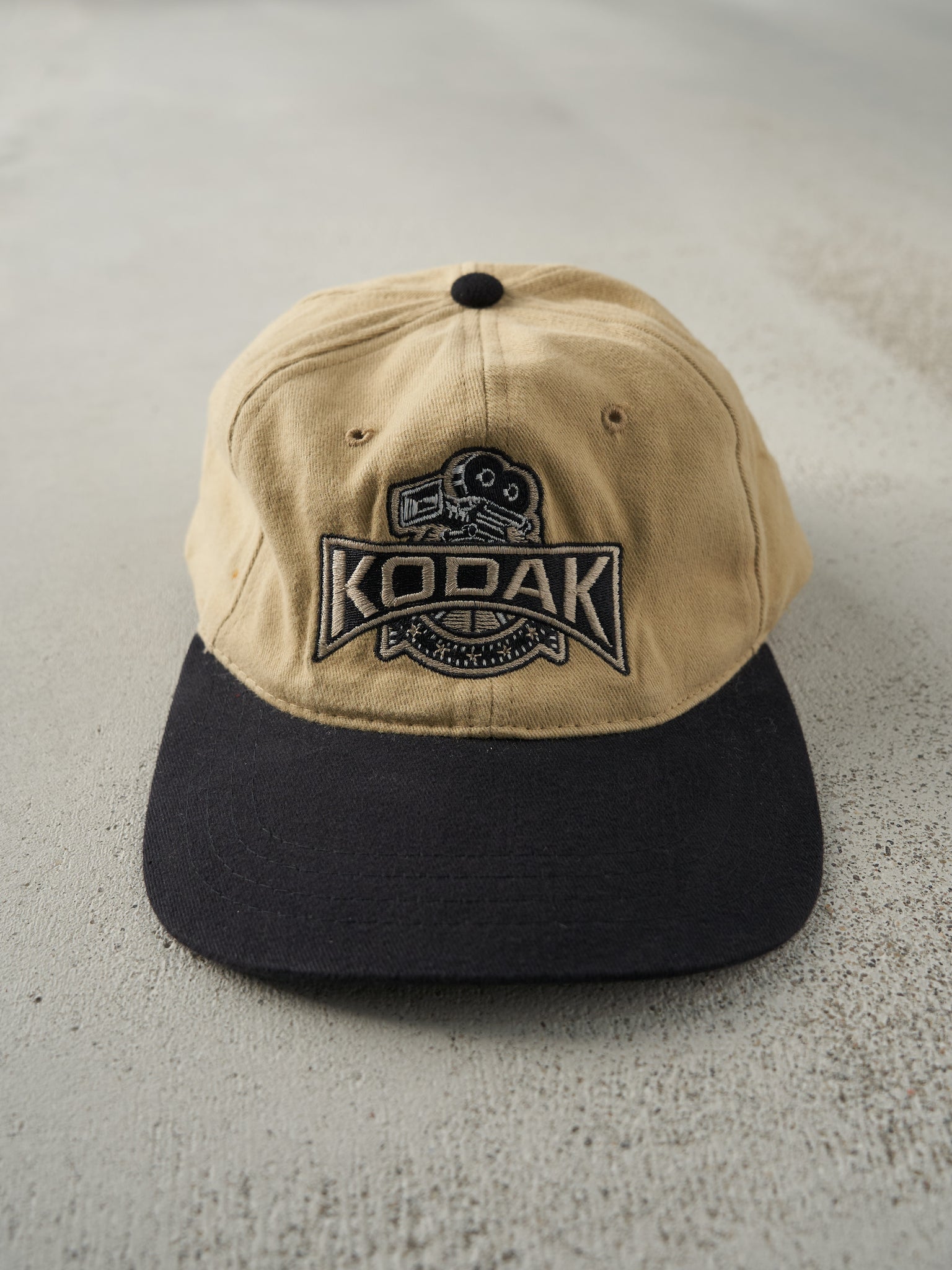 Vintage 90s Beige & Black Embroidered Kodak Strap Back Hat