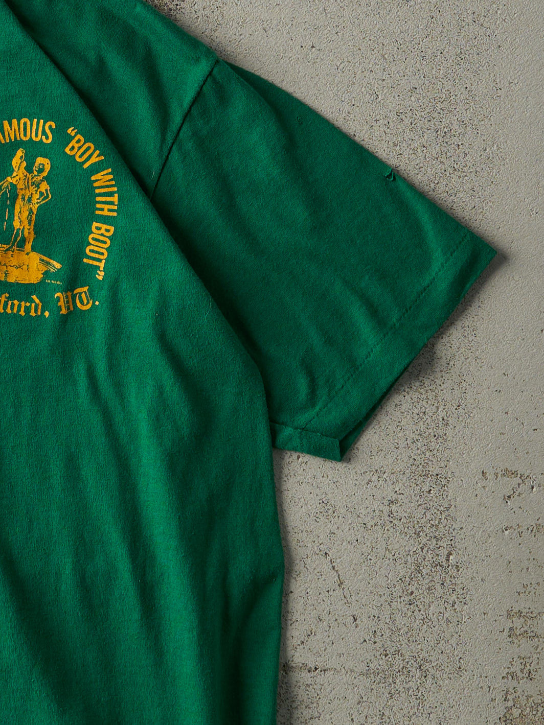 Vintage 80s Green "Boy With Boot" Single Stitch Tee (S)