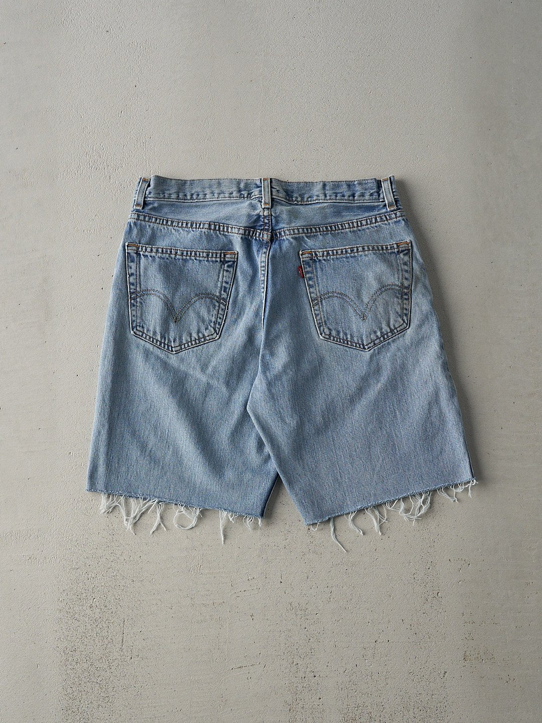 Vintage Y2K Light Wash Levi's 550 Relaxed Fit Cut Off Shorts (32x9)