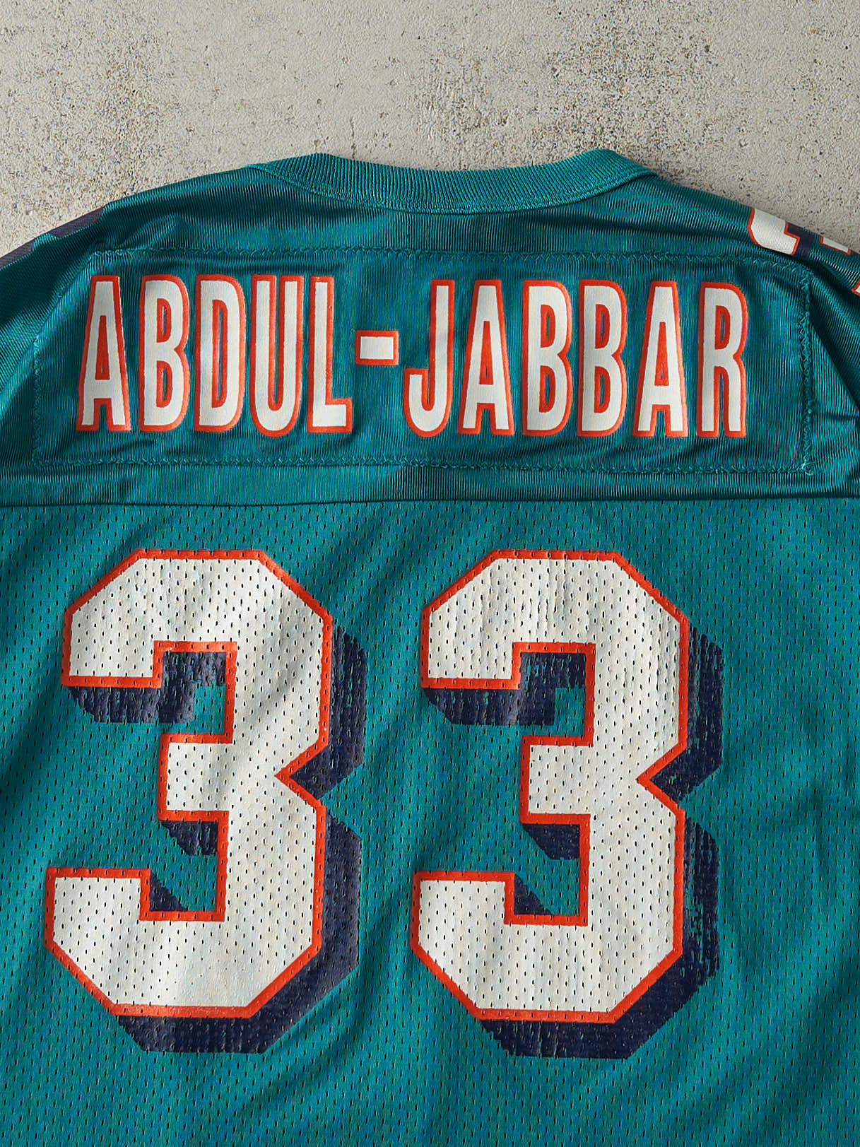 Vintage 90s Teal Miami Dolphins #33 Karim Abdul-Jabbar Cropped Football Jersey (L)