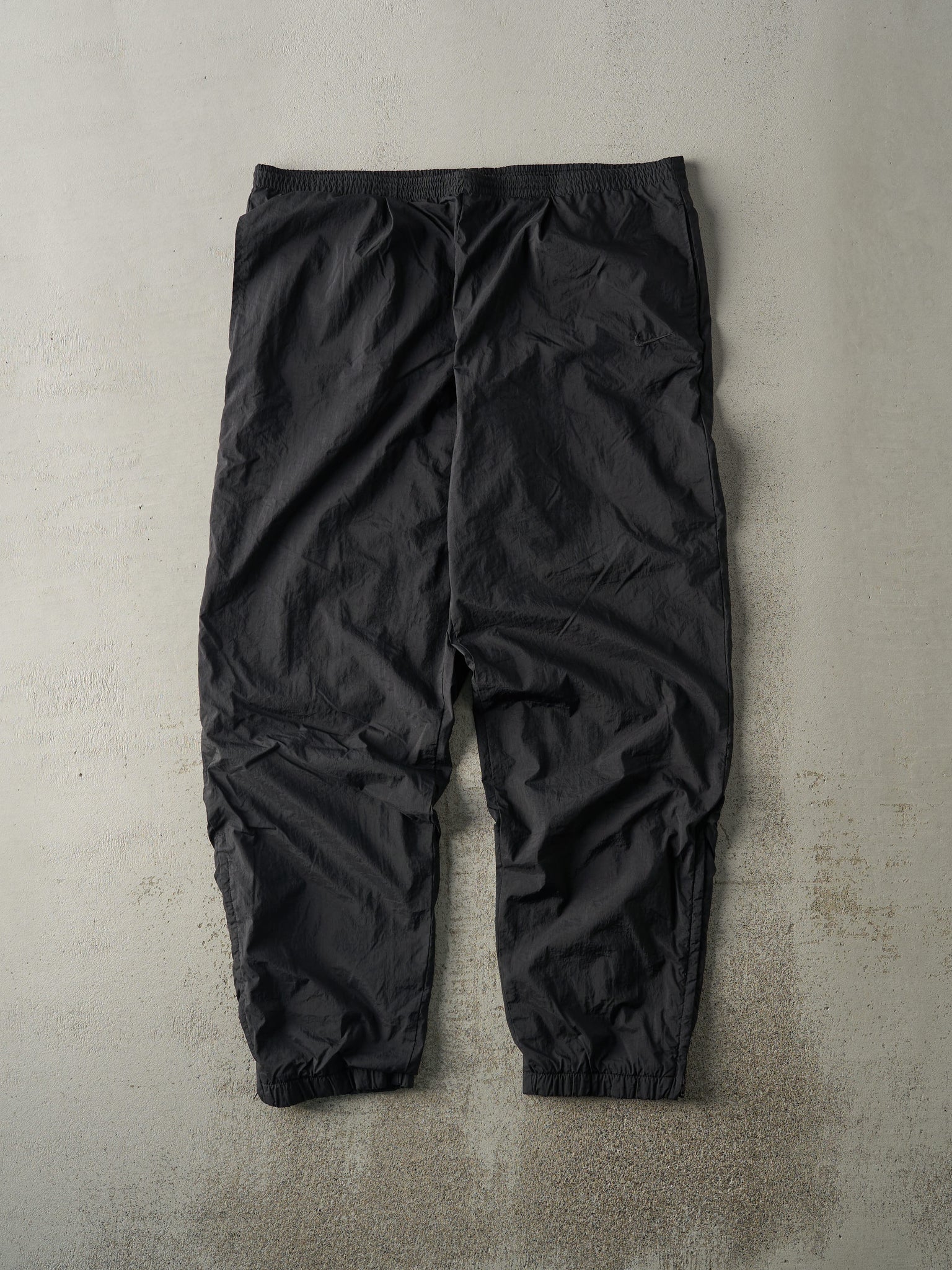 Vintage 90s Black Tonal Embroidered Nike Swoosh Track Pants (38x30.5)