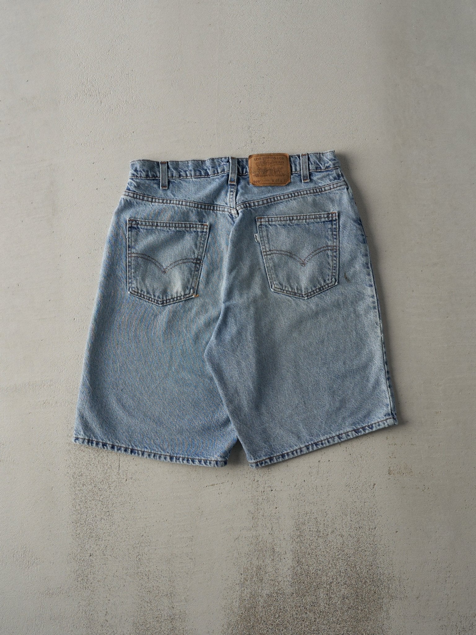 Vintage 80s Light Wash Levi's 560 Loose Fit White Tab Jean Shorts (33x10)