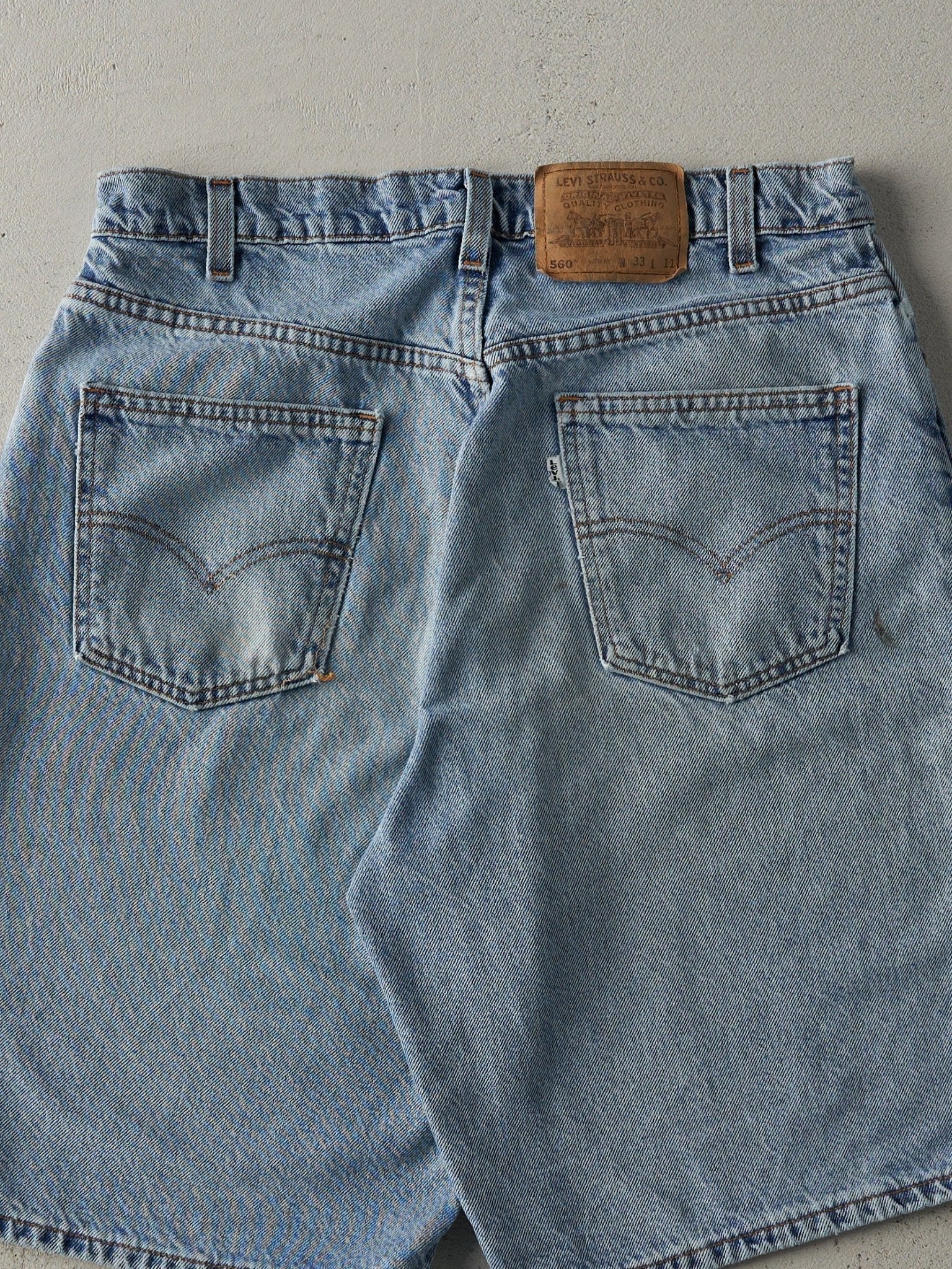 Vintage 80s Light Wash Levi's 560 Loose Fit White Tab Jean Shorts (33x10)