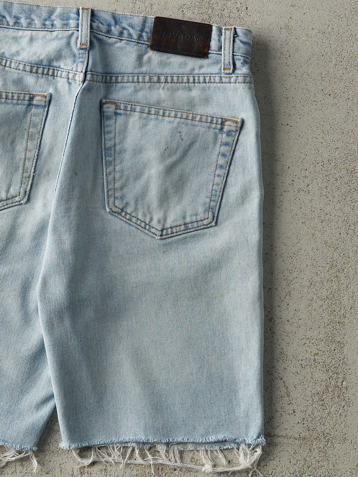 Vintage 90s Light Wash Nevada Cut Off Jean Shorts (32x9)