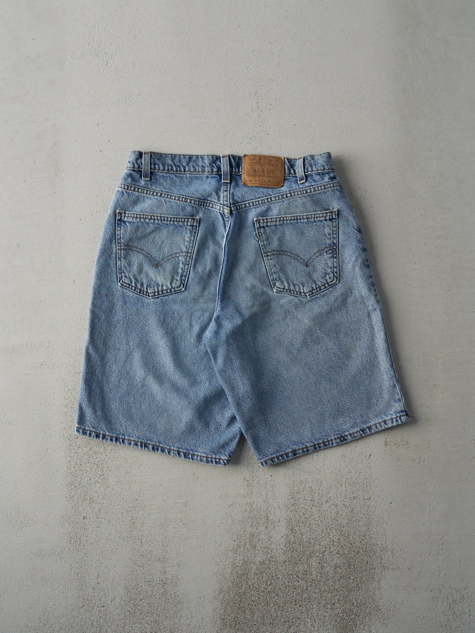 Vintage 90s Light Wash Levi's 560 Loose Fit Jean Shorts (32x10)