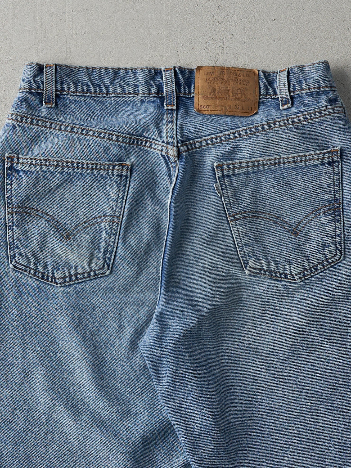 Vintage 90s Light Wash Levi's 560 Loose Fit Jean Shorts (32x10)