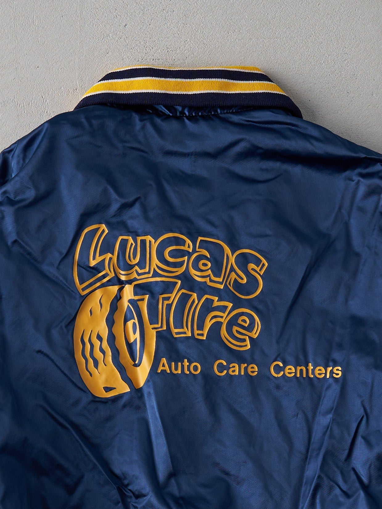Vintage 70s Navy Blue Lucas Tire Nylon Bomber Jacket (L)