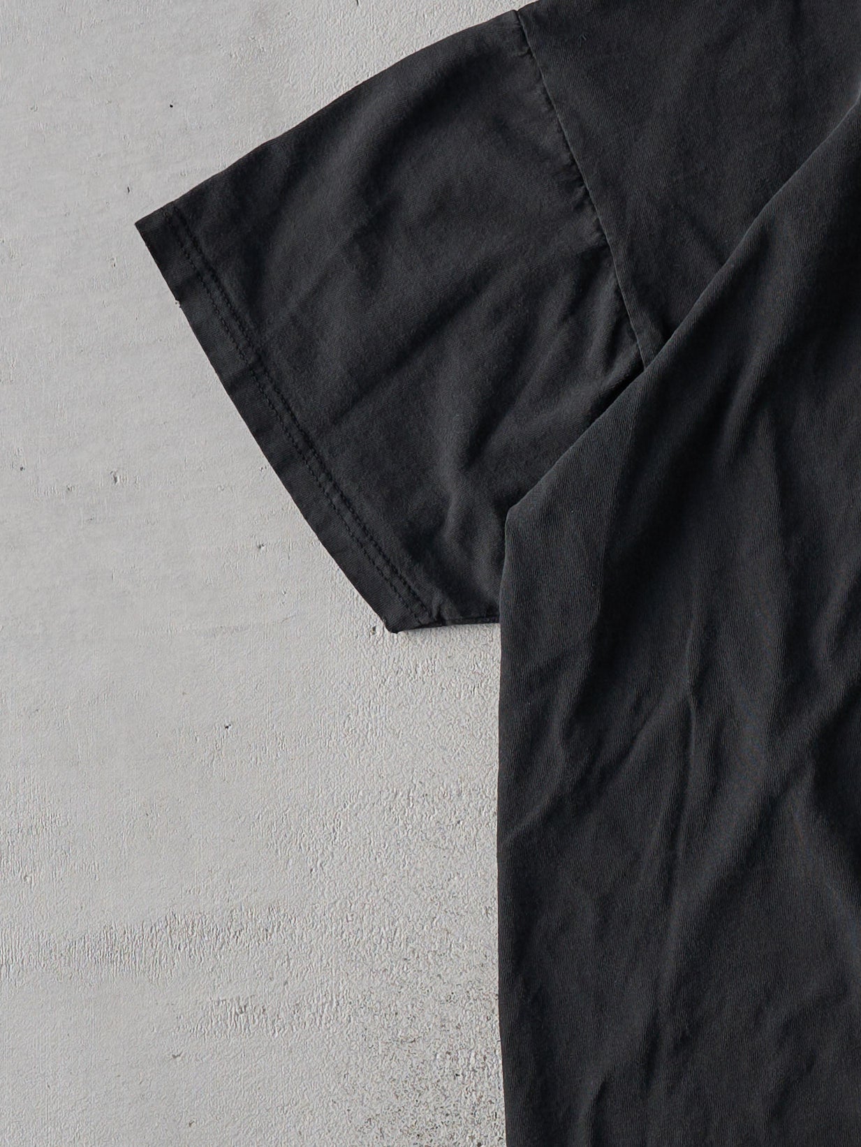 Vintage 90s Faded Black Russell Athletics Blank Tee (L/XL)