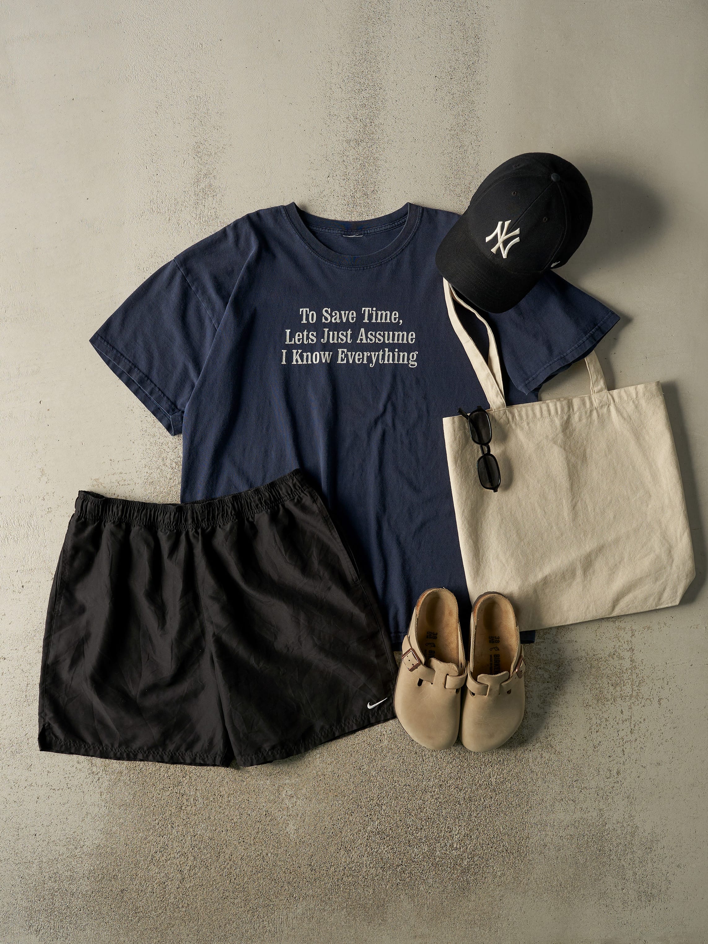 Vintage 90s Navy Blue "Assume I Know Everything" Slogan Tee (L/XL)
