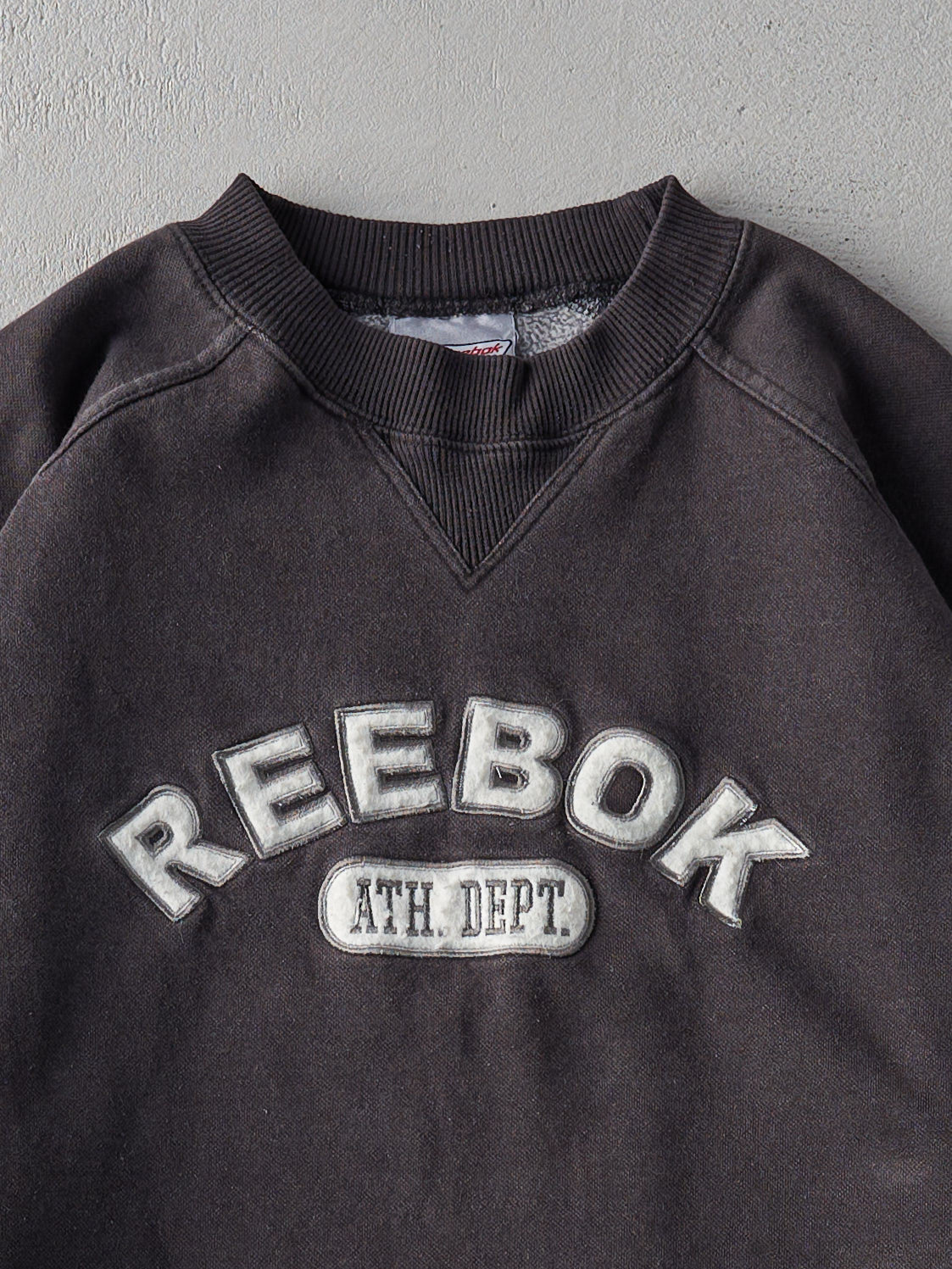 Vintage 90s Faded Black Reebok Boxy Crewneck (L)