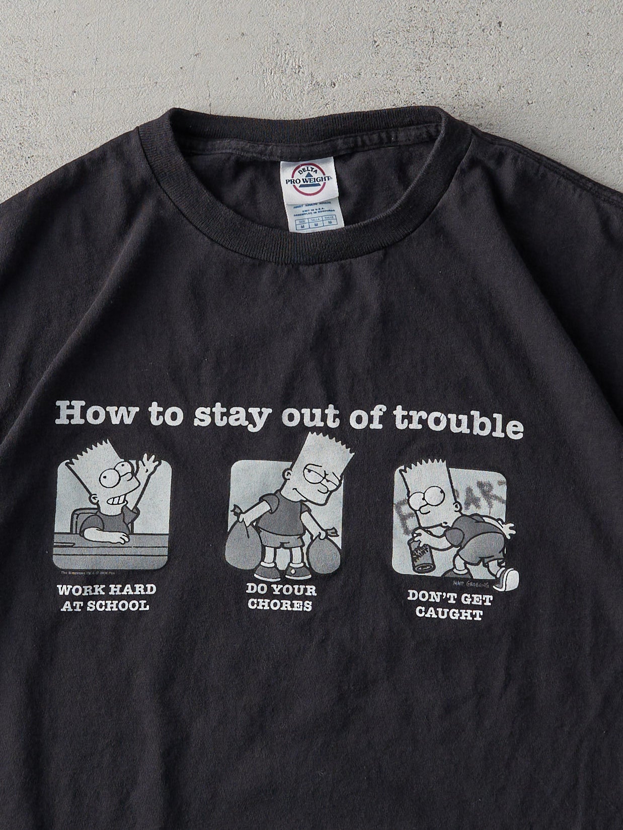 Vintage Y2K Black "How to Stay Out of Trouble" Tee (M)