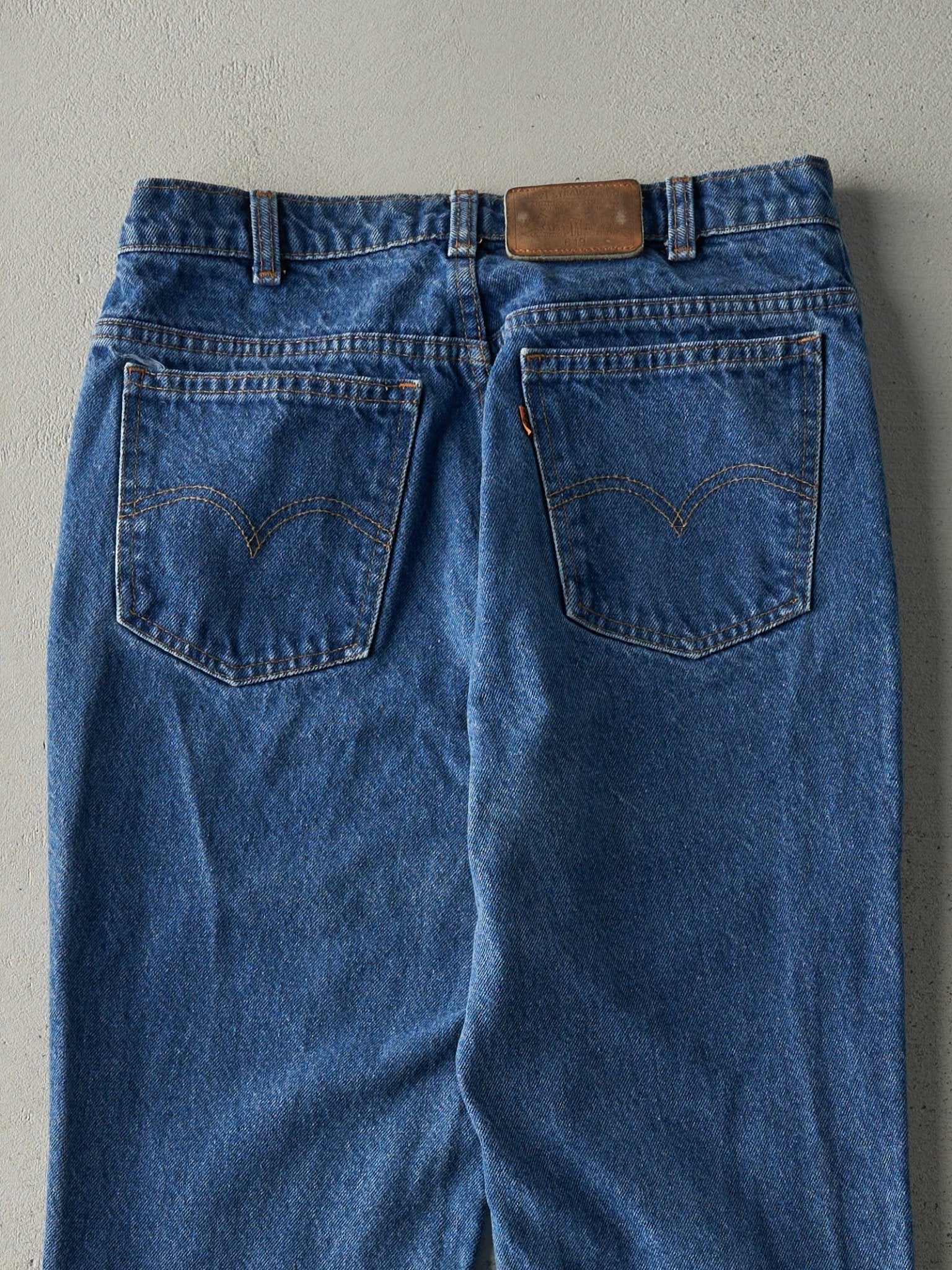Vintage 80s Mid Wash Levi's 619 Orange Tab Jeans (30x31)