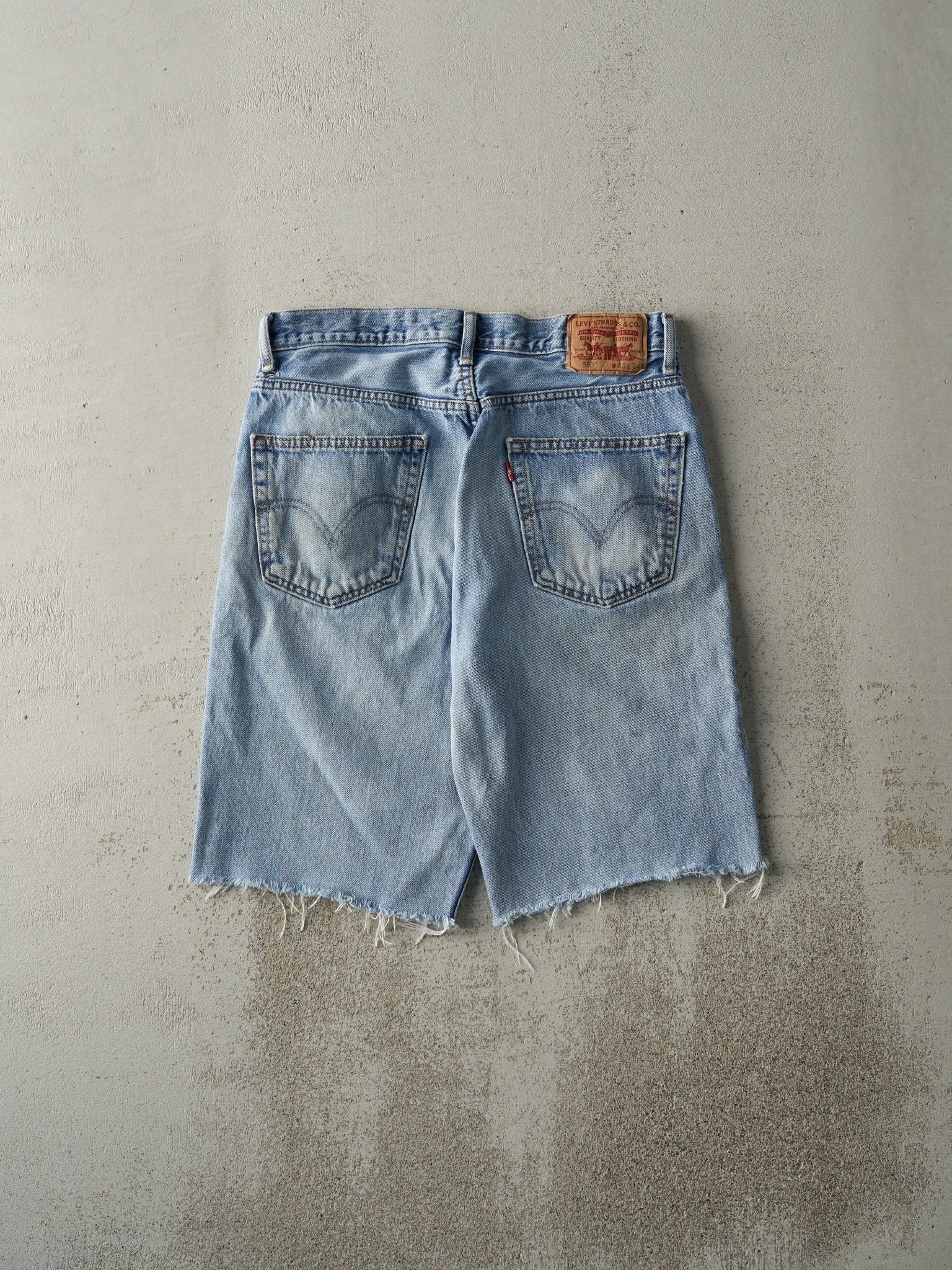 Vintage Y2K Light Wash Levi's 550 Relaxed Fit Cut Off Jean Shorts (32x11.5)