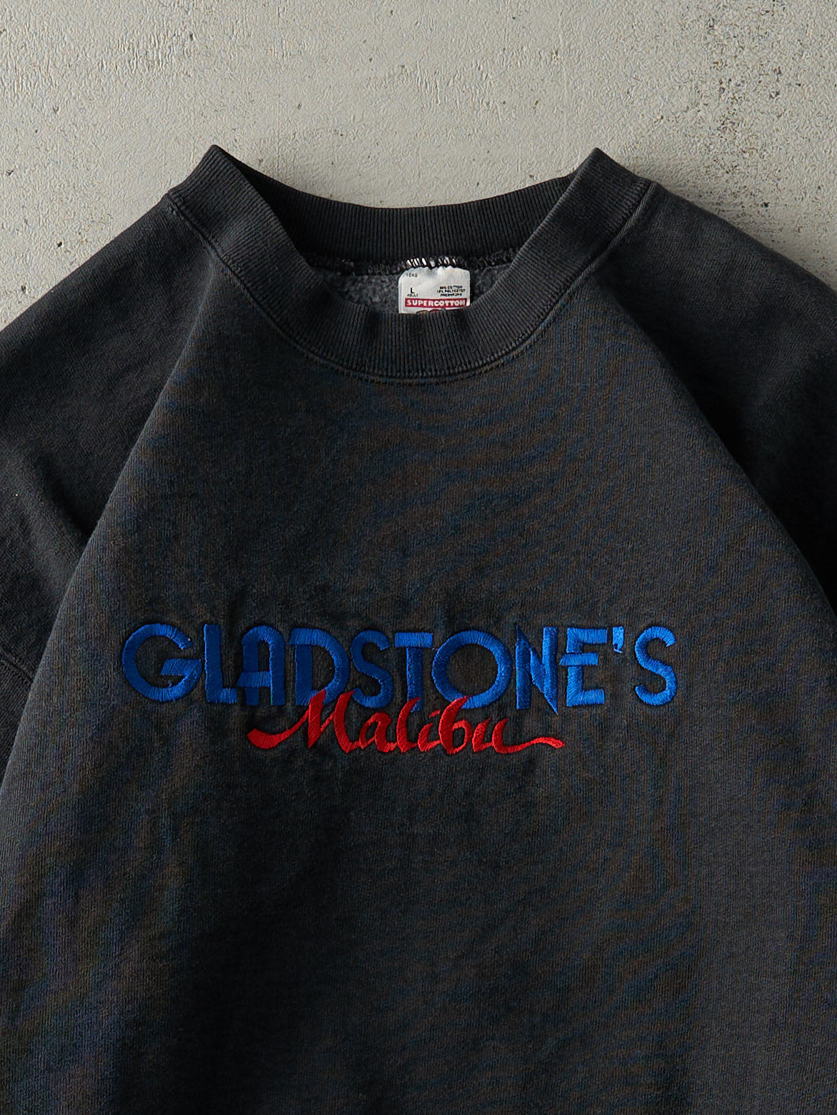 Vintage 90s Washed Black Embroidered Gladstone's Malibu Crewneck (M)