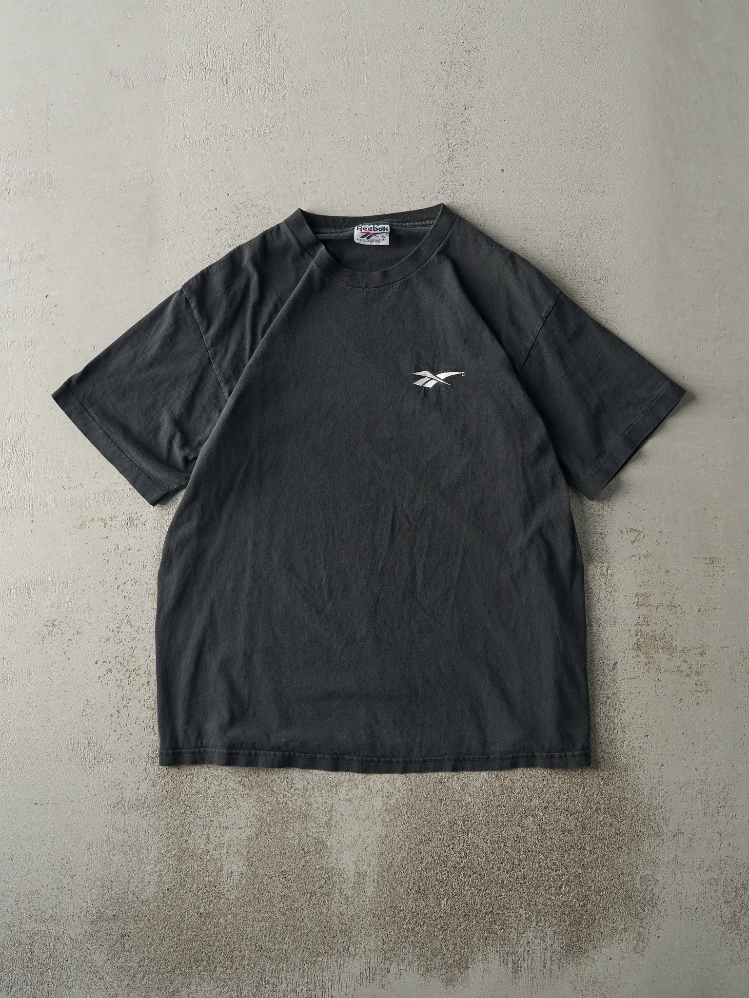 Vintage 90s Faded Black Embroidered Reebok Logo Tee (M/L)