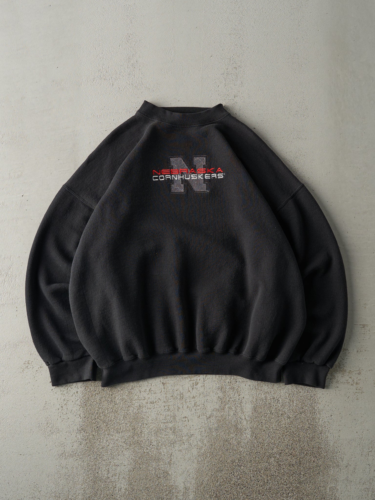 Vintage 90s Black Embroidered Nebraska Cornhuskers Crewneck (XL)