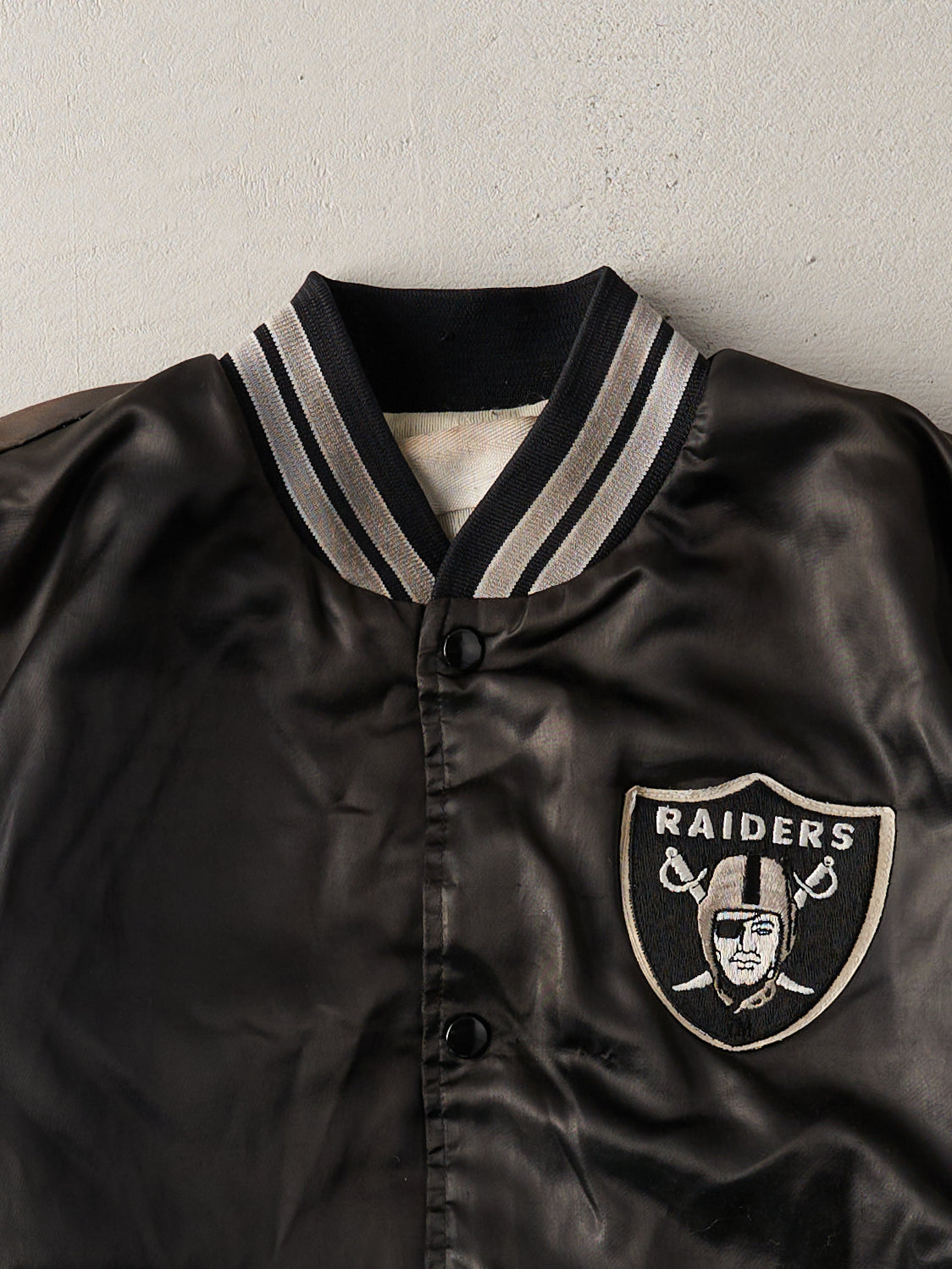 Vintage 90s Black Raiders Satin Varsity Jacket (L)