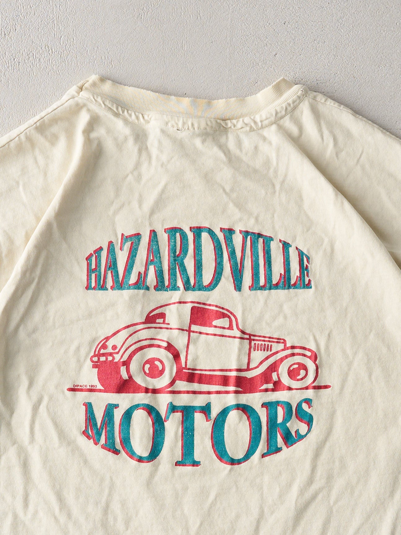 Vintage '93 Washed Yellow Hazardville Motors Single Stitch Tee (L)