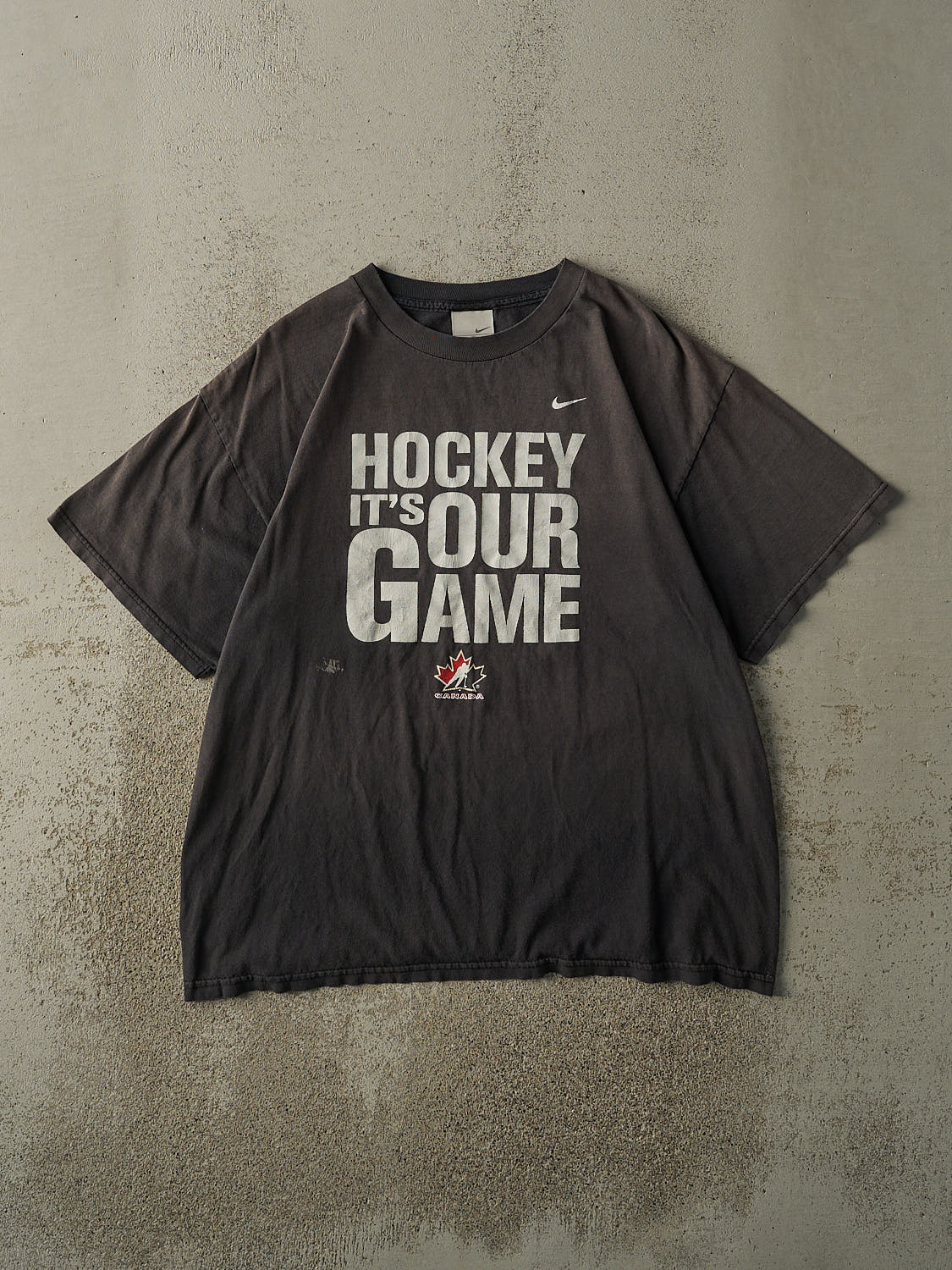 Vintage Y2K Faded Black "Hockey It's Our Game" Team Canada Nike Tee (L/XL)