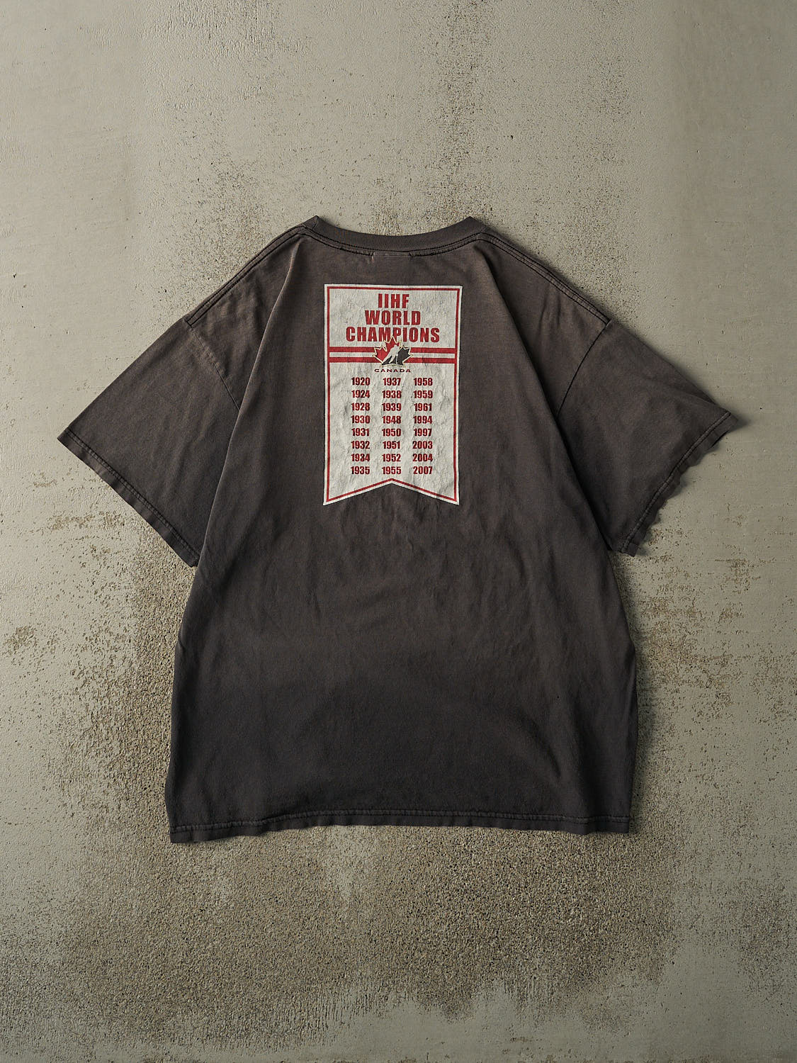 Vintage Y2K Faded Black "Hockey It's Our Game" Team Canada Nike Tee (L/XL)