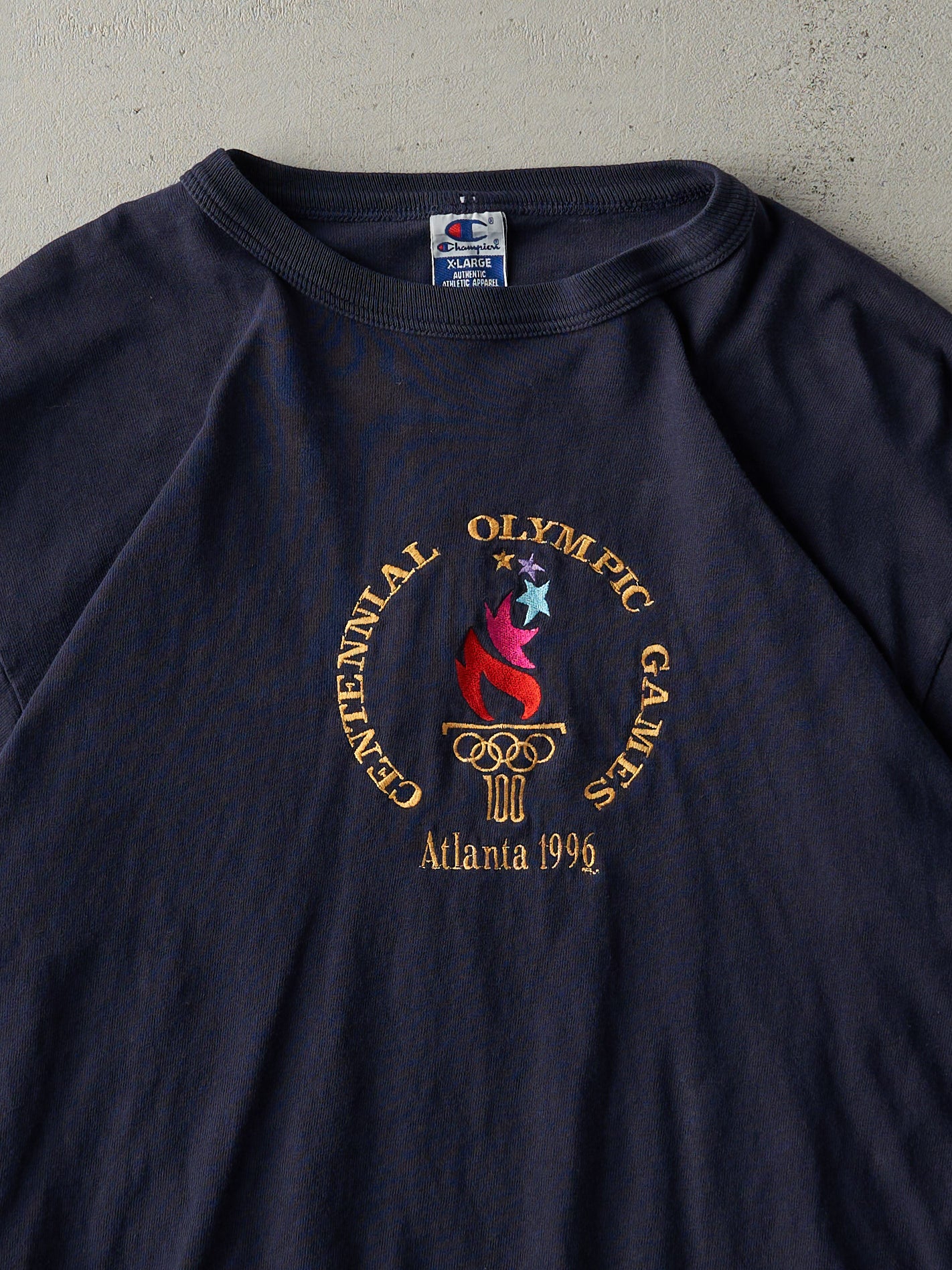 Vintage 96' Navy Blue Embroidered Atlanta Olympics Champion Tee (L)