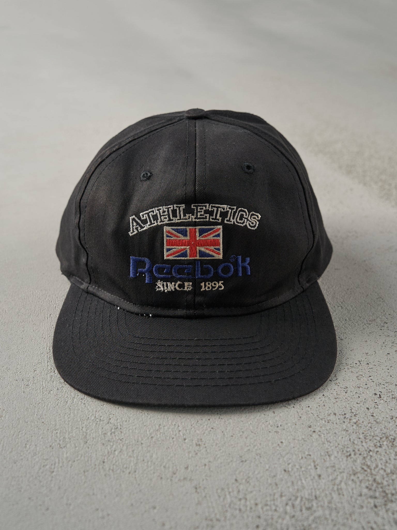 Vintage 80s Black Embroidered Reebok Snapback Hat