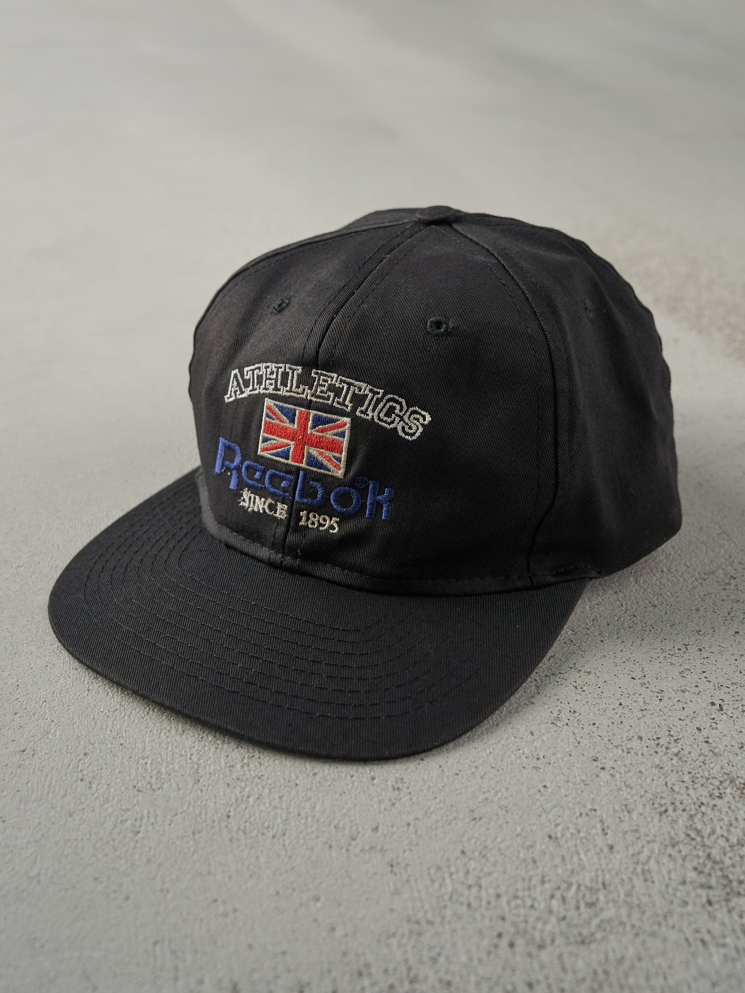 Vintage 80s Black Embroidered Reebok Snapback Hat