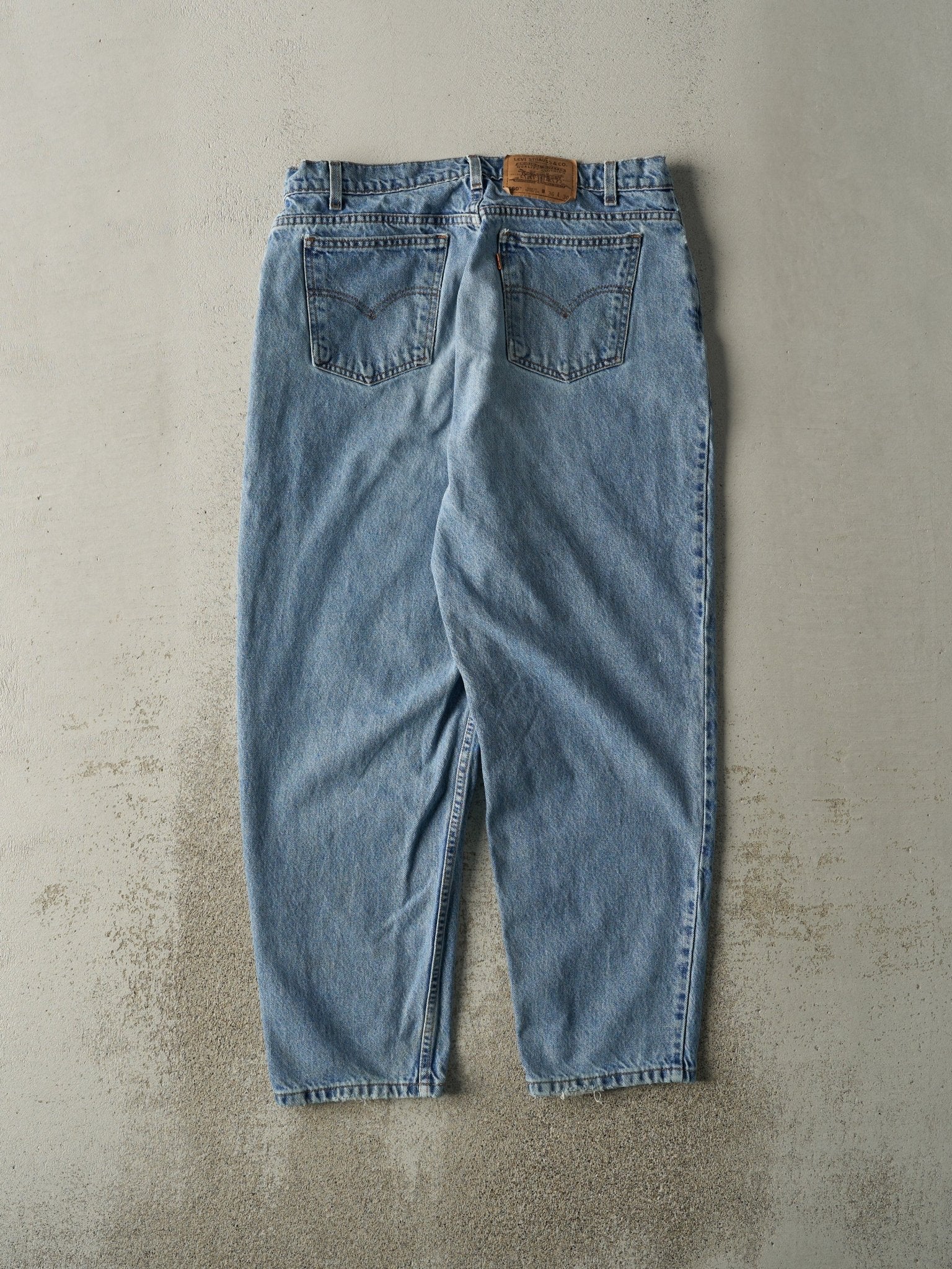 Vintage 90s Light Wash Levi's 560 Orange Tab Jeans (34x29)