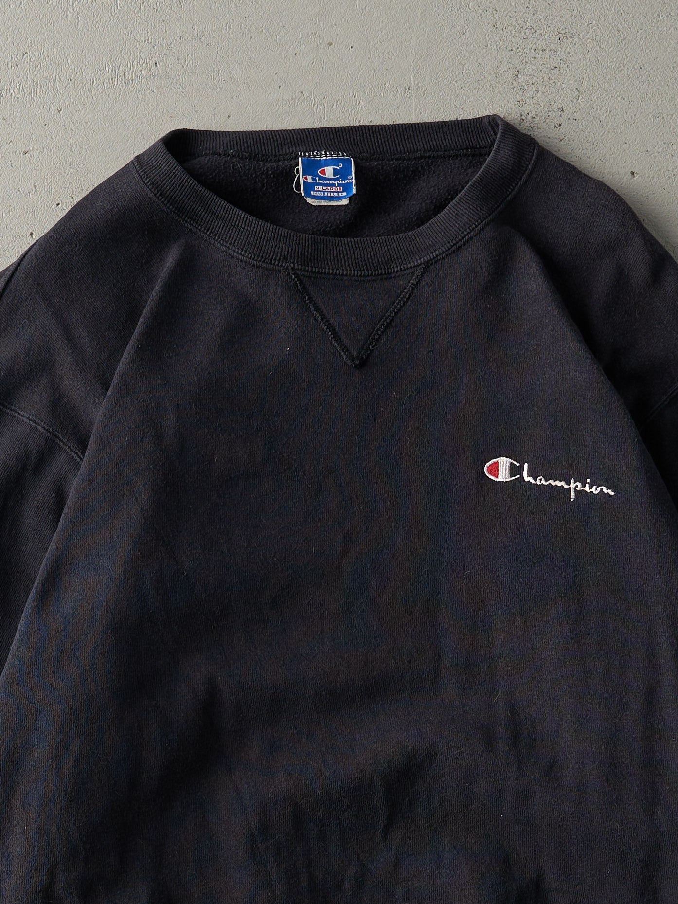 Vintage 90s Faded Black Embroidered Champion Crewneck (L/XL)