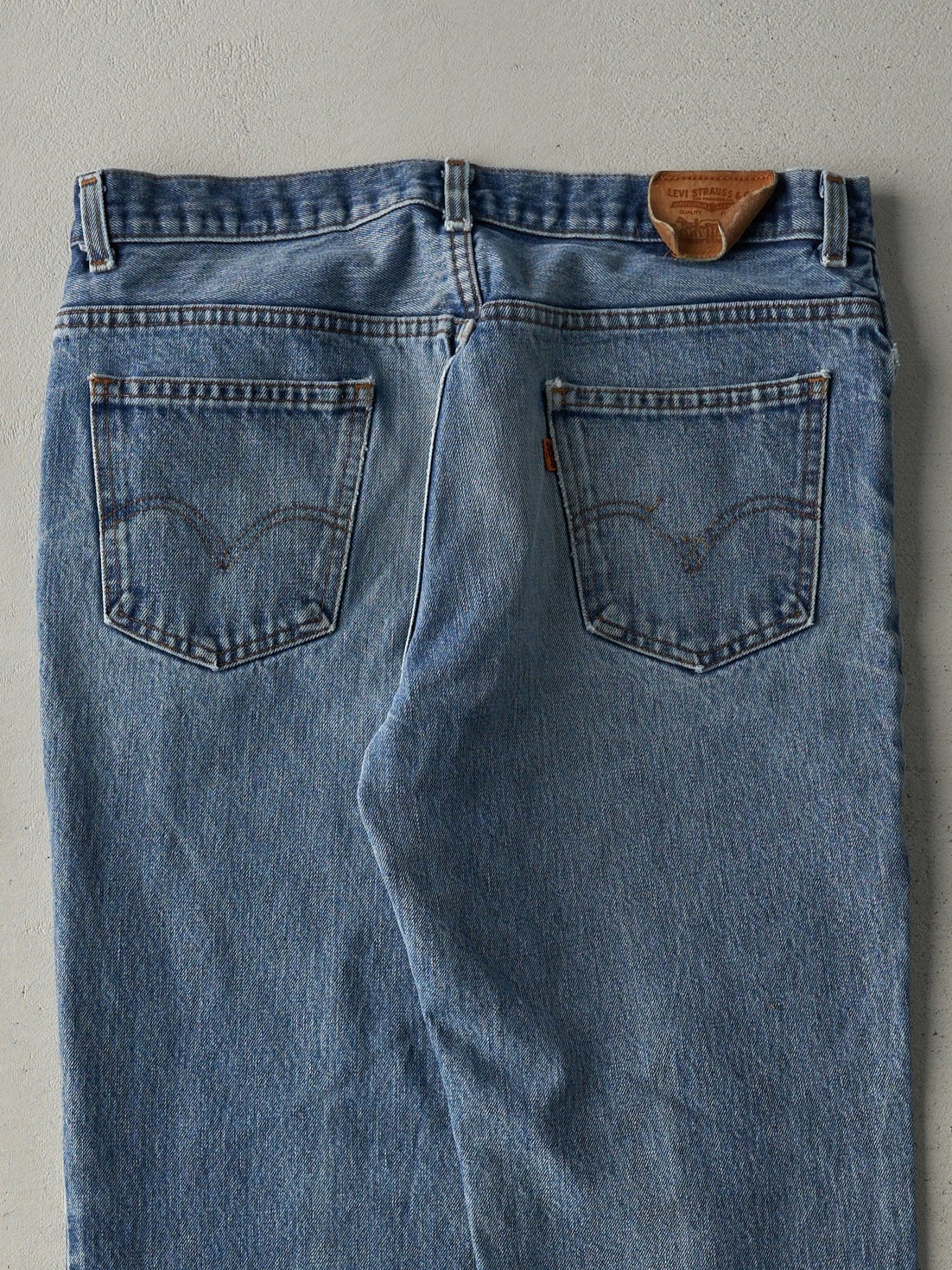Vintage 80s Light Wash Levi's Orange Tab Released Hem Jeans (34x29)