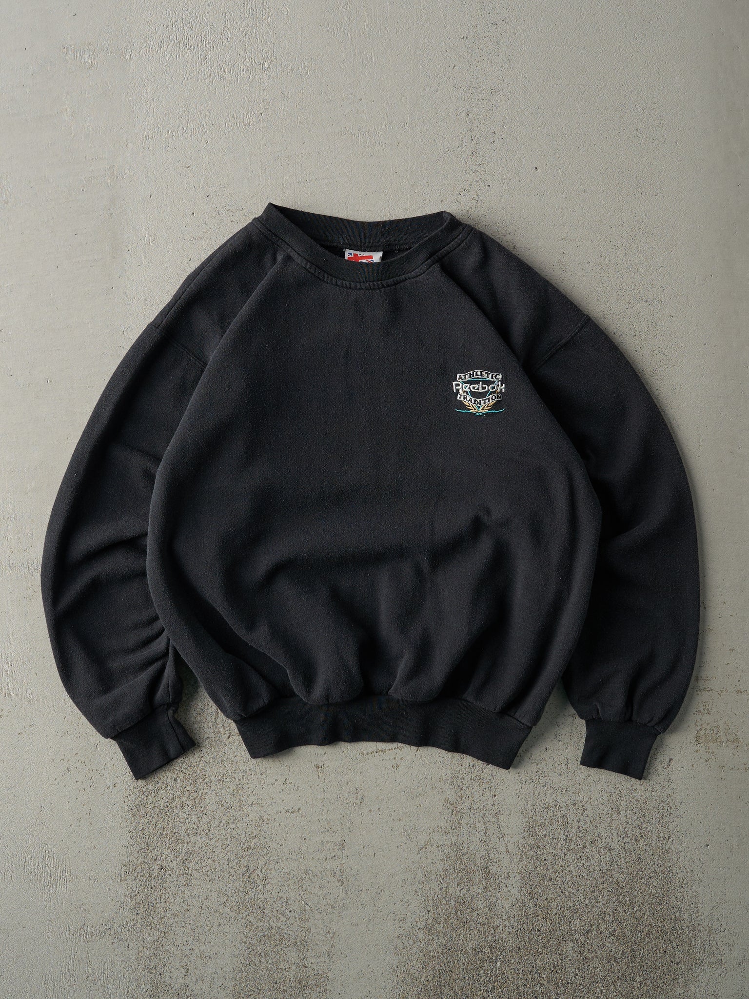 Vintage 80s Faded Black Embroidered Reebok Crewneck (M)