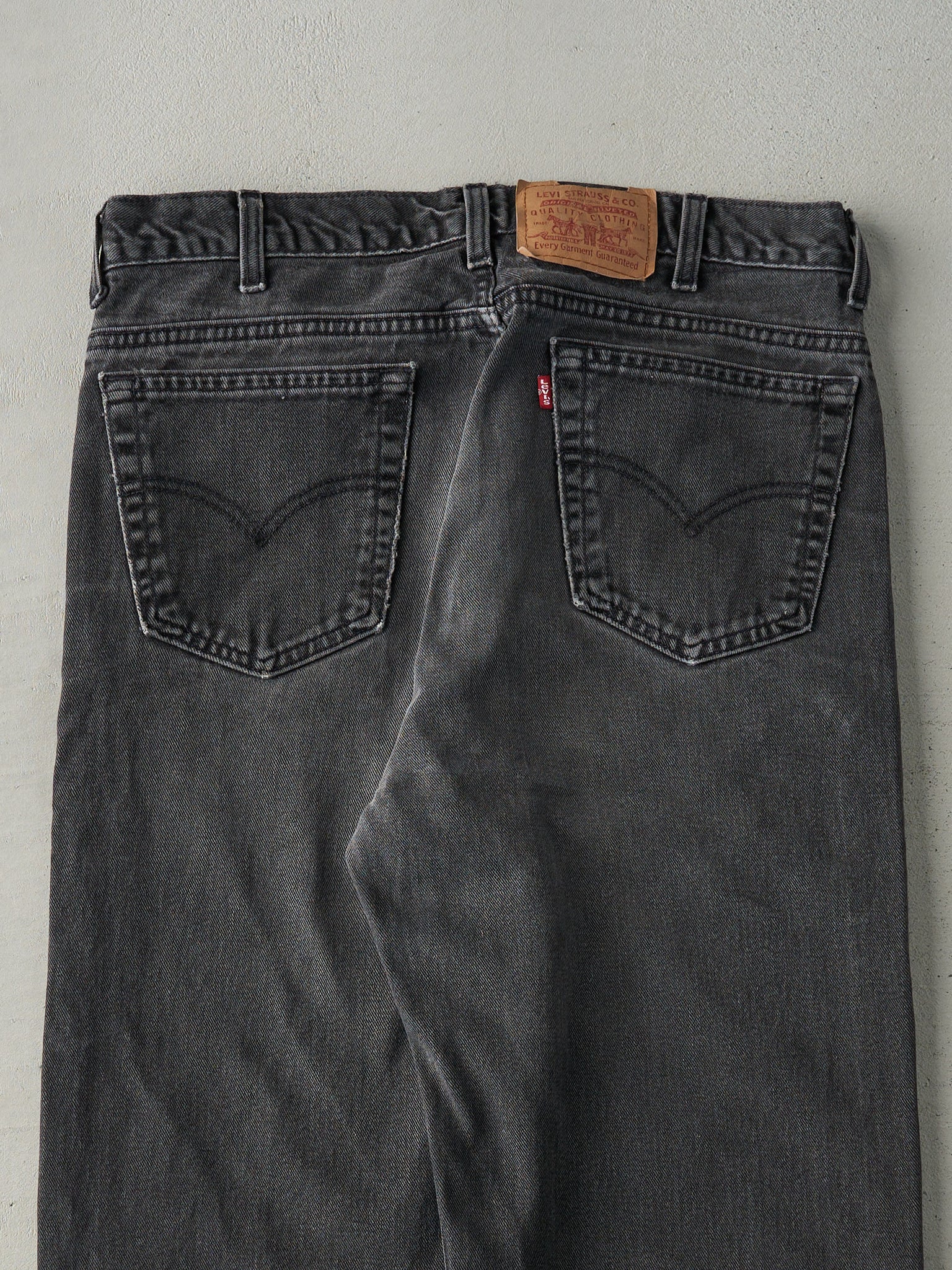 Vintage 90s Faded Black Levi's 550 Denim Pants (35x28)