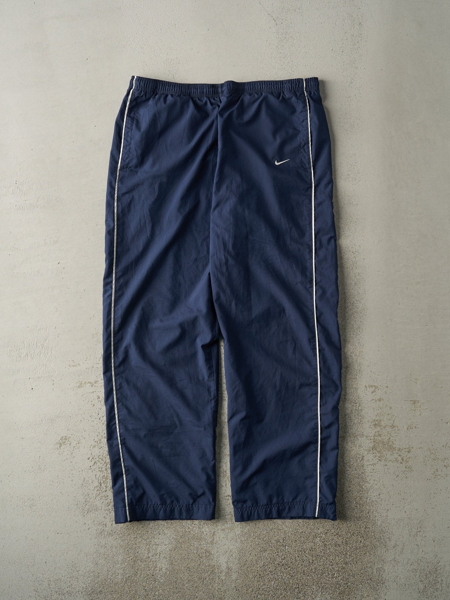 Vintage Y2K Navy Blue Nike Embroidered Windbreaker Pants (38x32.5)