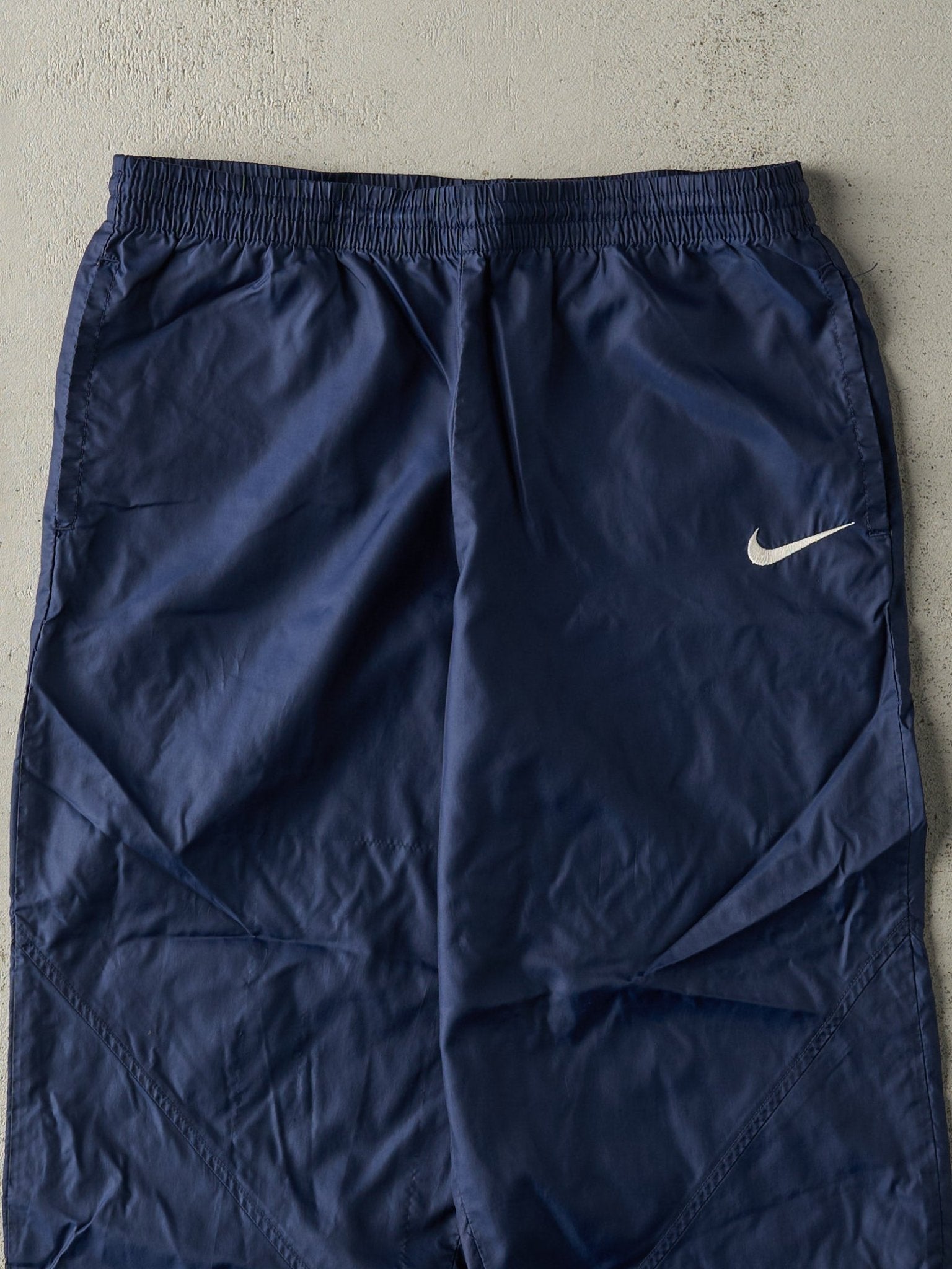 Vintage 90s Navy Blue Embroidered Nike Windbreaker Pants (30x27.5)