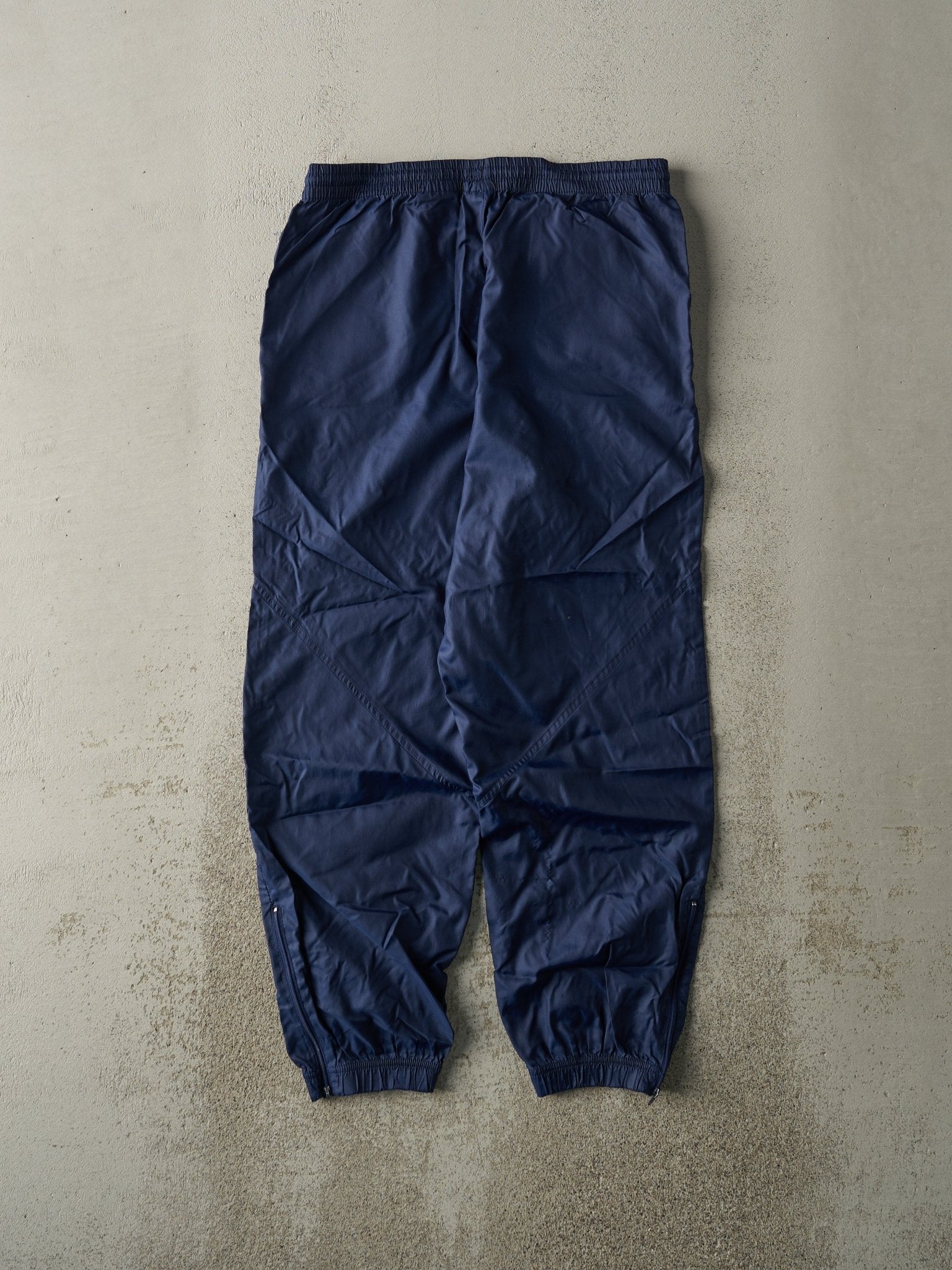 Vintage 90s Navy Blue Embroidered Nike Windbreaker Pants (30x27.5)