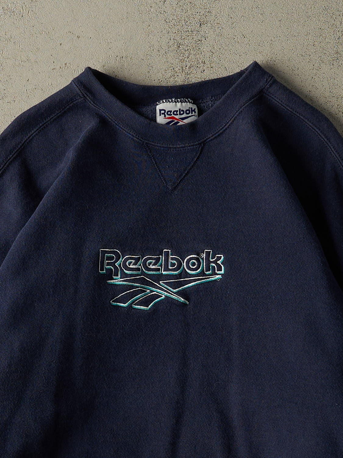 Vintage 90s  Navy Blue Reebok Embroidered Crewneck (XL)