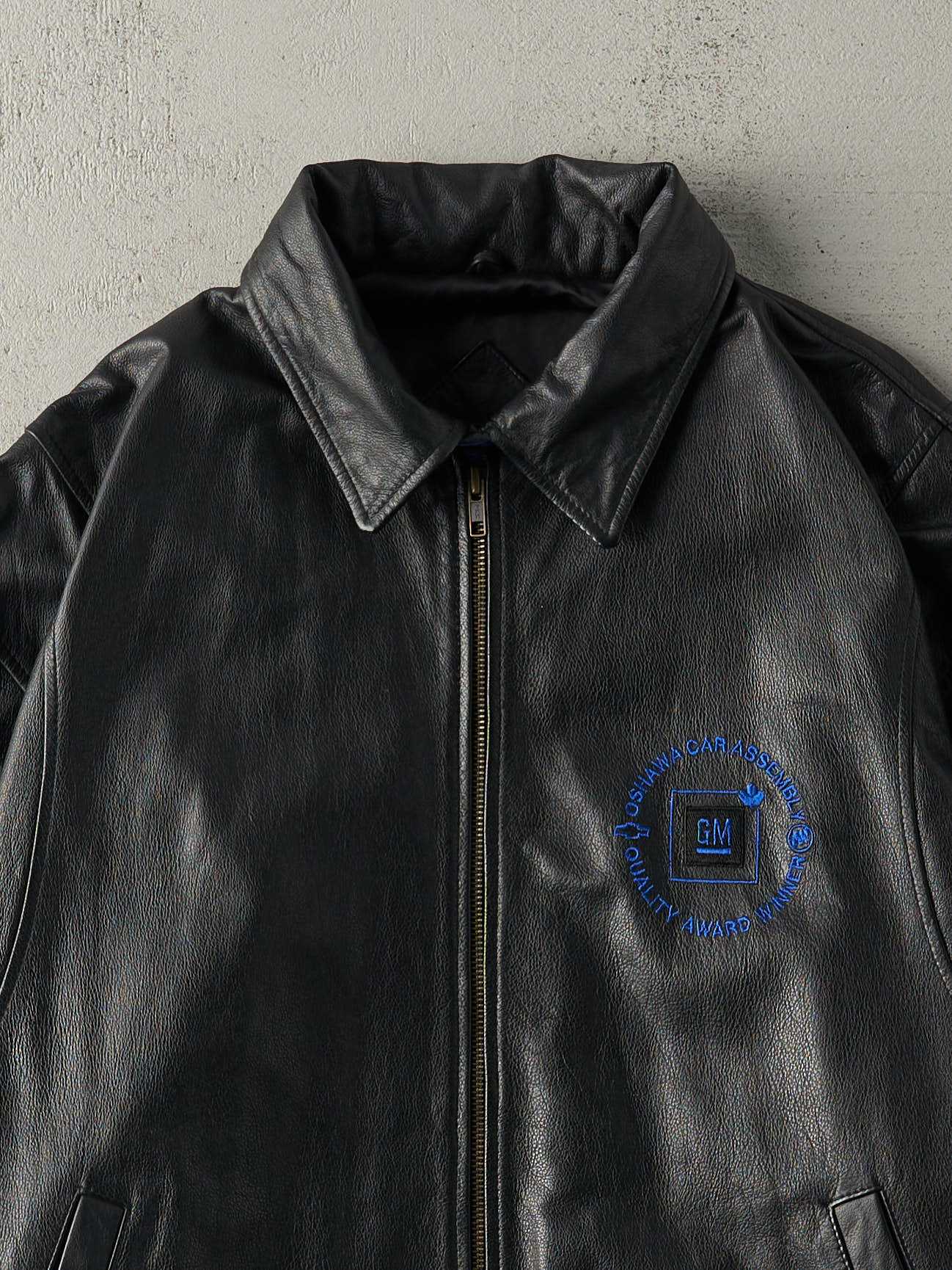 Vintage Y2K Black & Blue GM Embroidered Leather Jacket (L/XL)