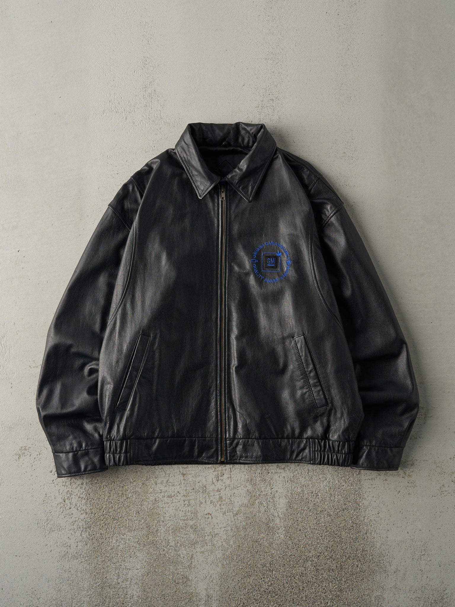 Vintage Y2K Black & Blue GM Embroidered Leather Jacket (L/XL)