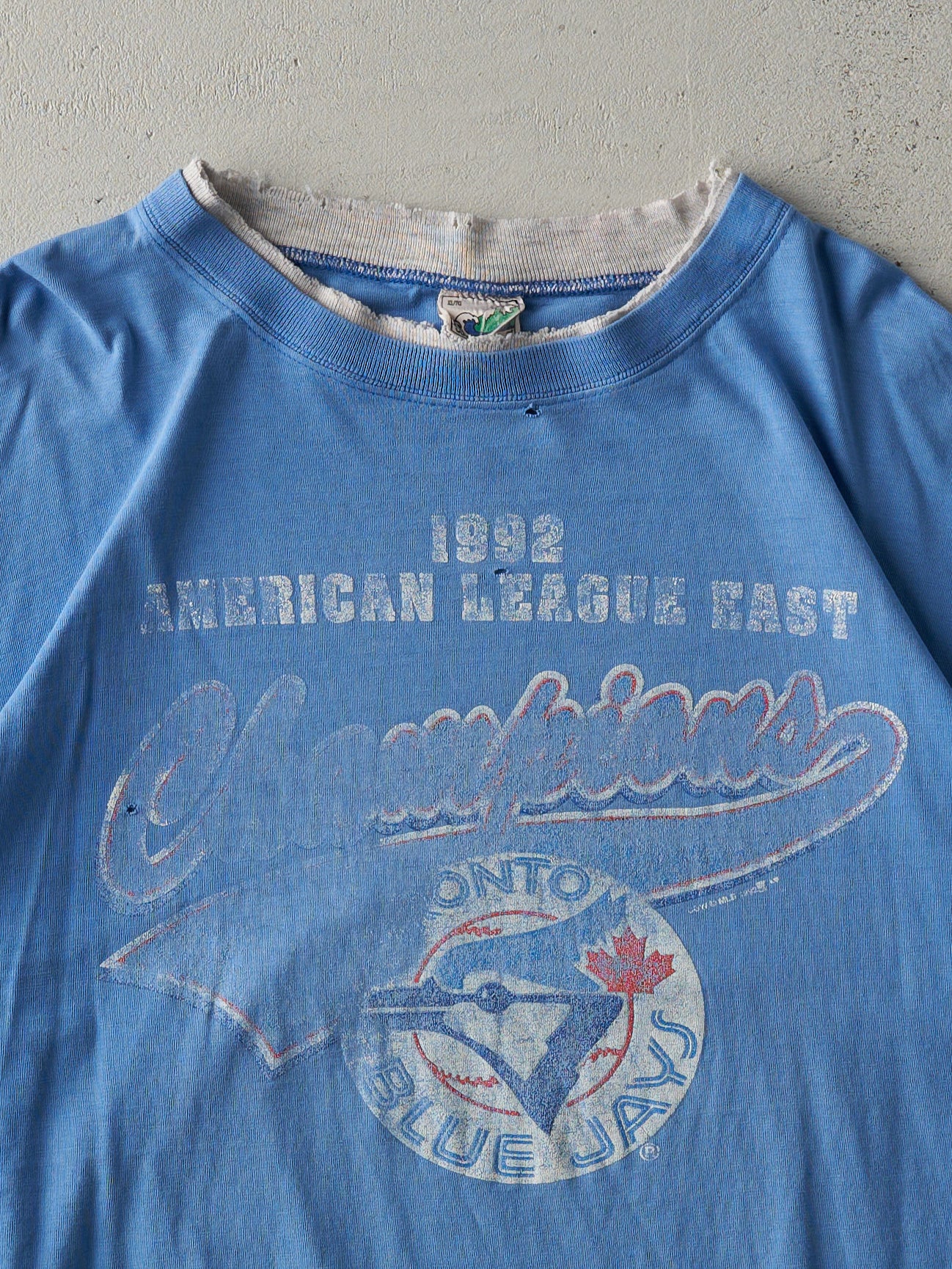 Vintage 92' Faded Blue Toronto Blue Jays ALE Champions Double Neck Tee (L)