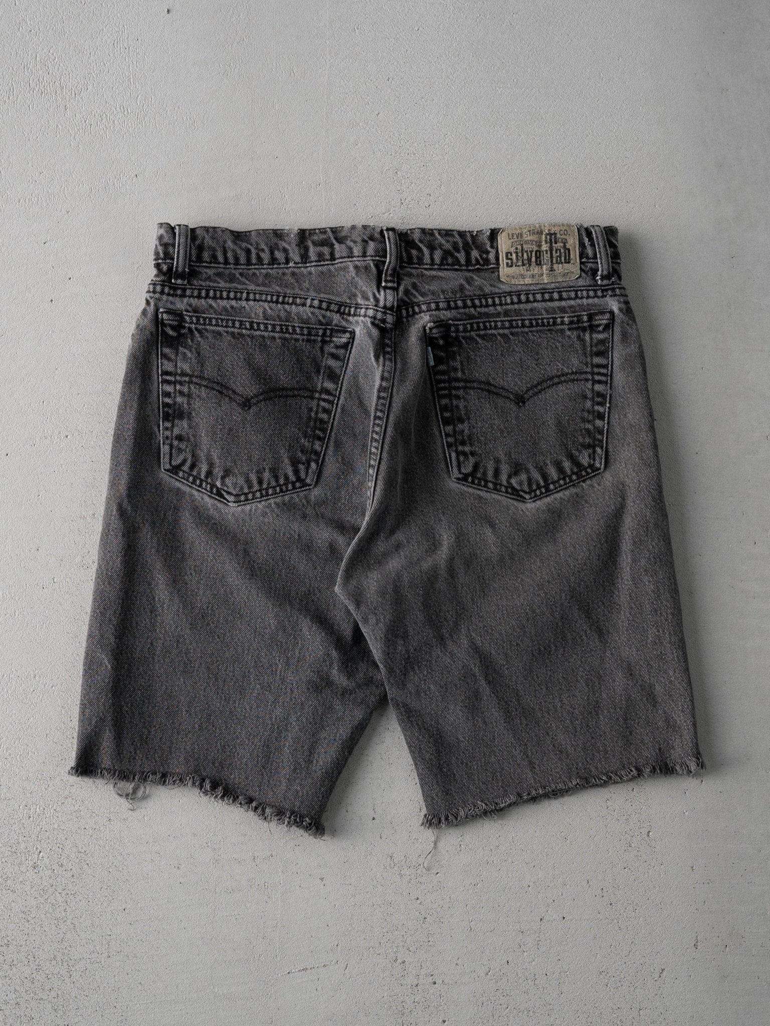 Vintage 90s Washed Black Silver Tab Levi Cut Off Denim Shorts (32)