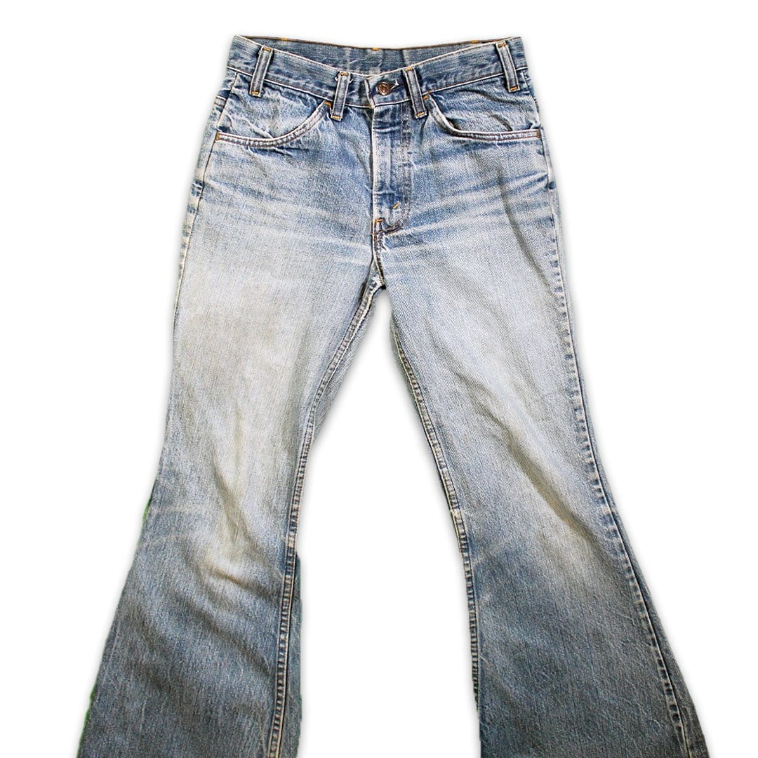 Vintage 80s High Waisted Distressed Levi Bellbottom Jeans | Rebalance Vintage.