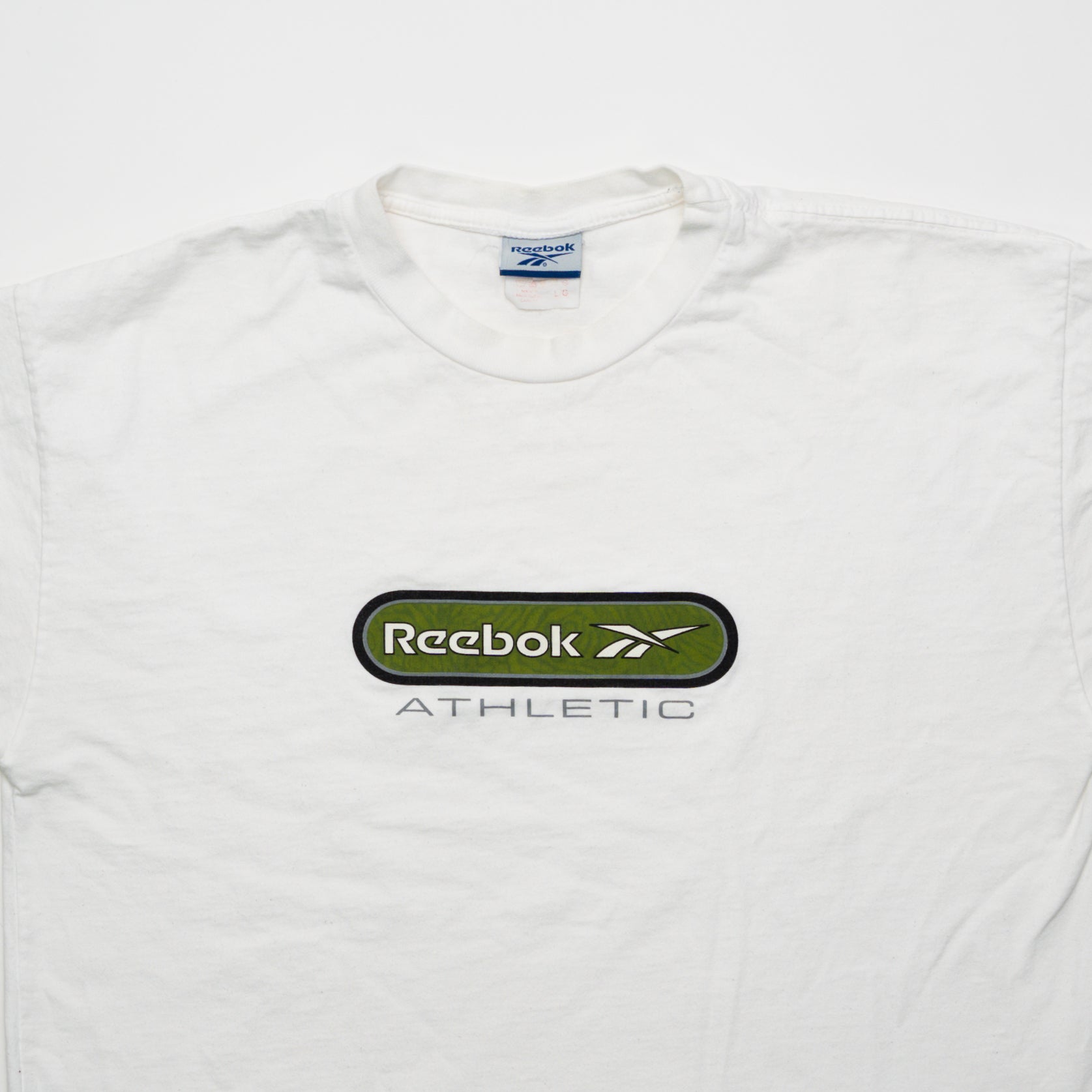 Vintage 90s White Reebok Athletic Logo Tee (M) | Rebalance Vintage.