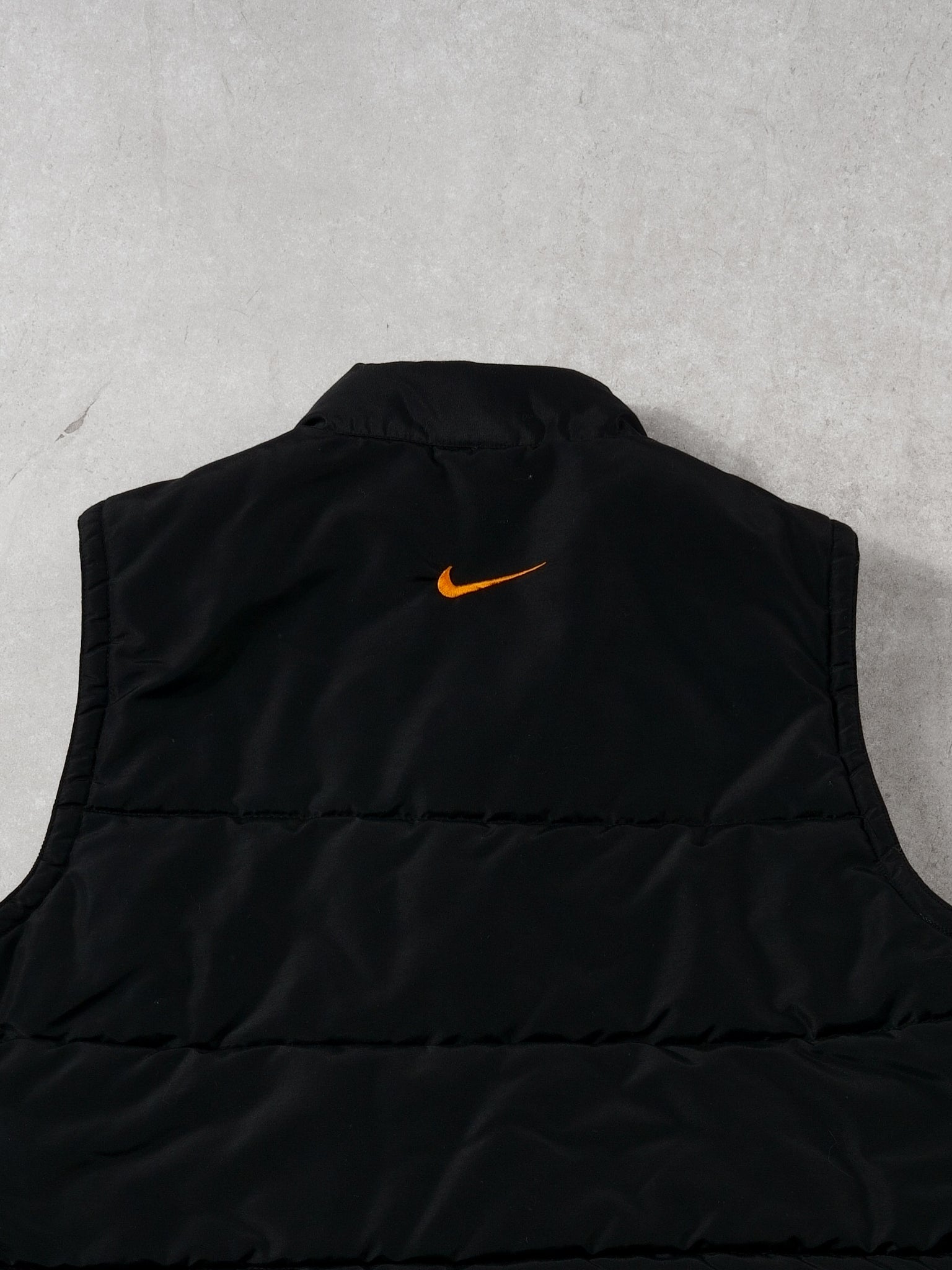 Vintage 90s Black + Orange Nike Puffer Vest (M)