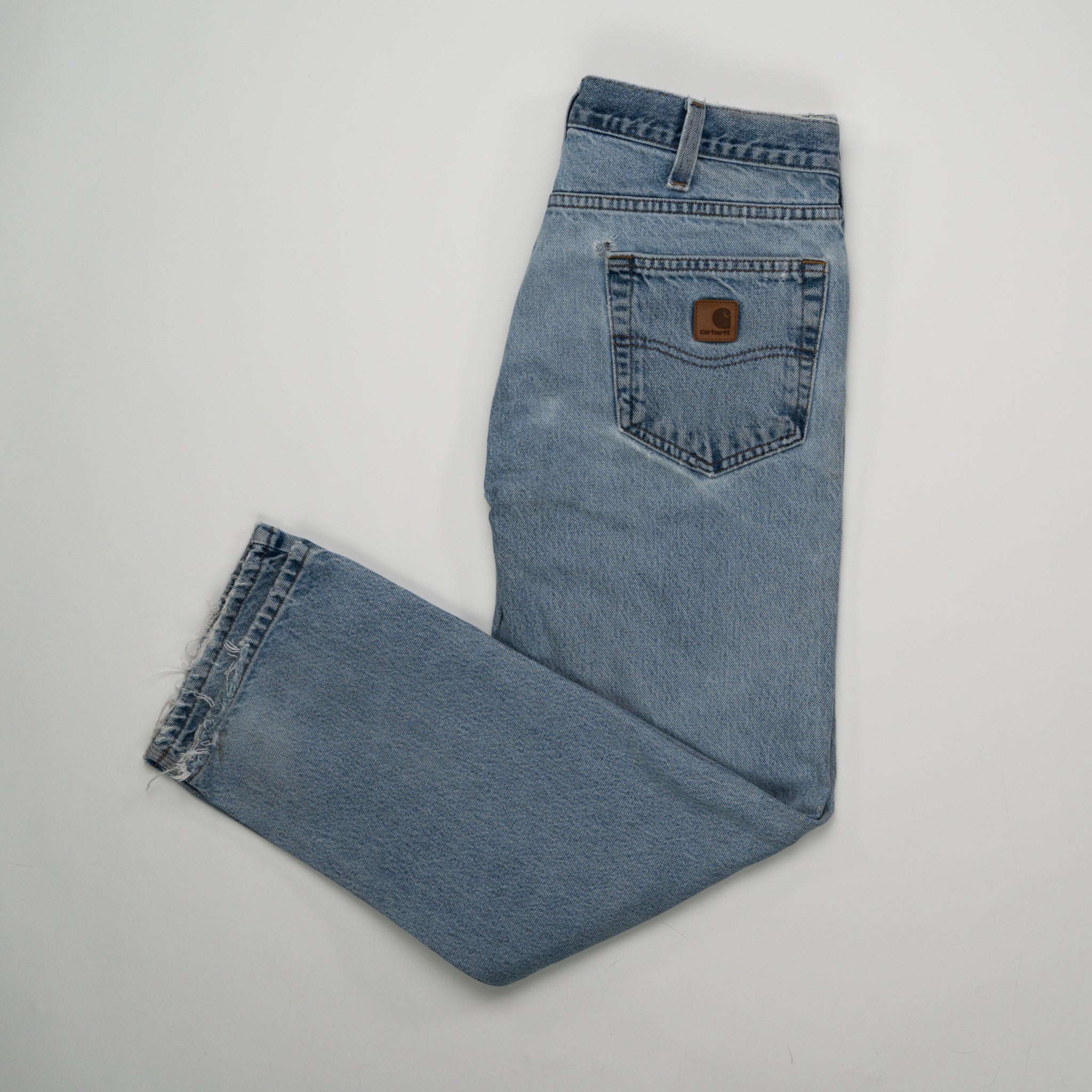 Vintage Carhartt Light Washed Ripped Jeans (34 x 30) | Rebalance Vintage.